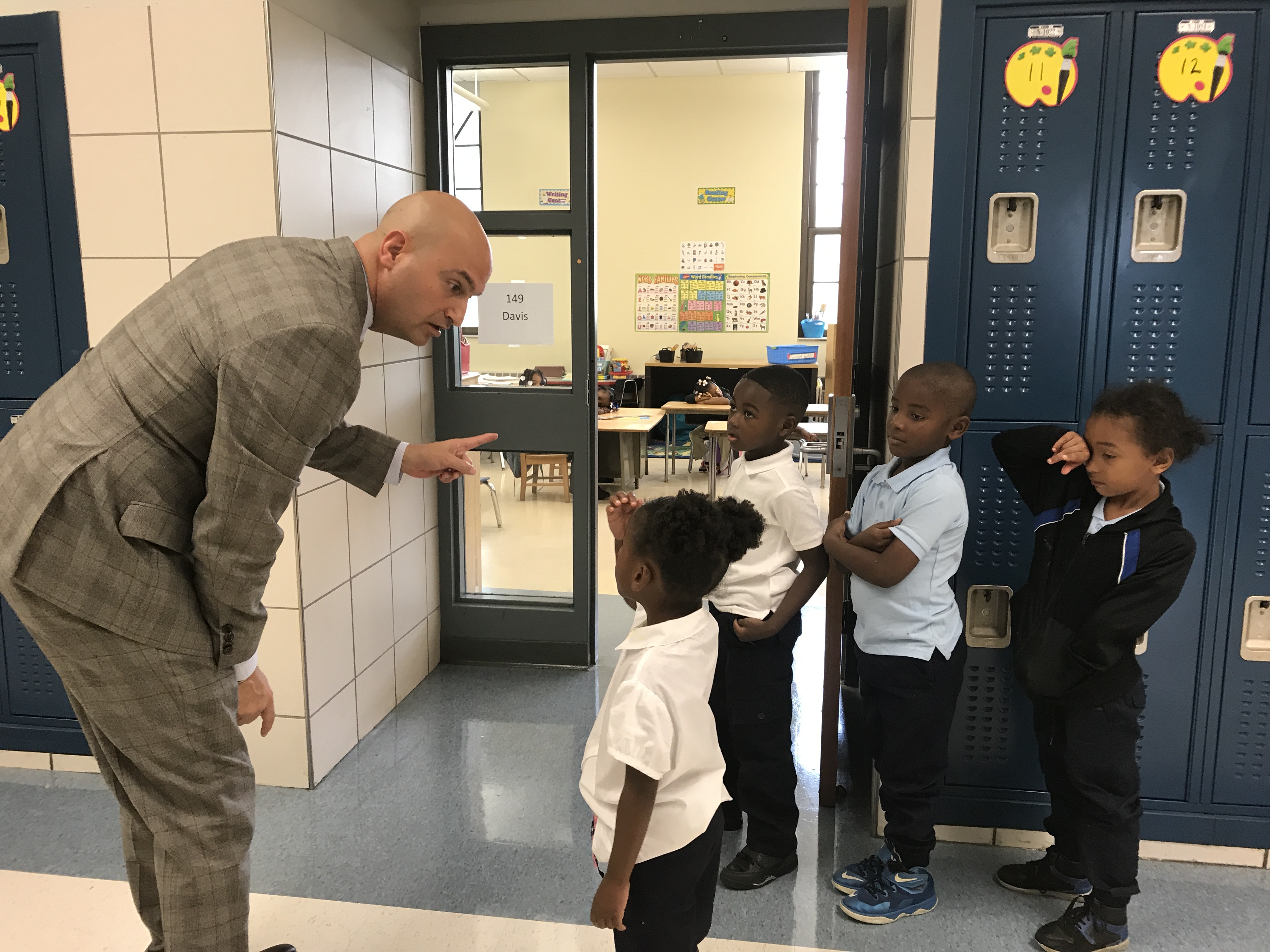 Detroit supertintendent Nikolai Vitti talks with students at Durfee Elementary/Middle School on the first day of school, September 5, 2017.