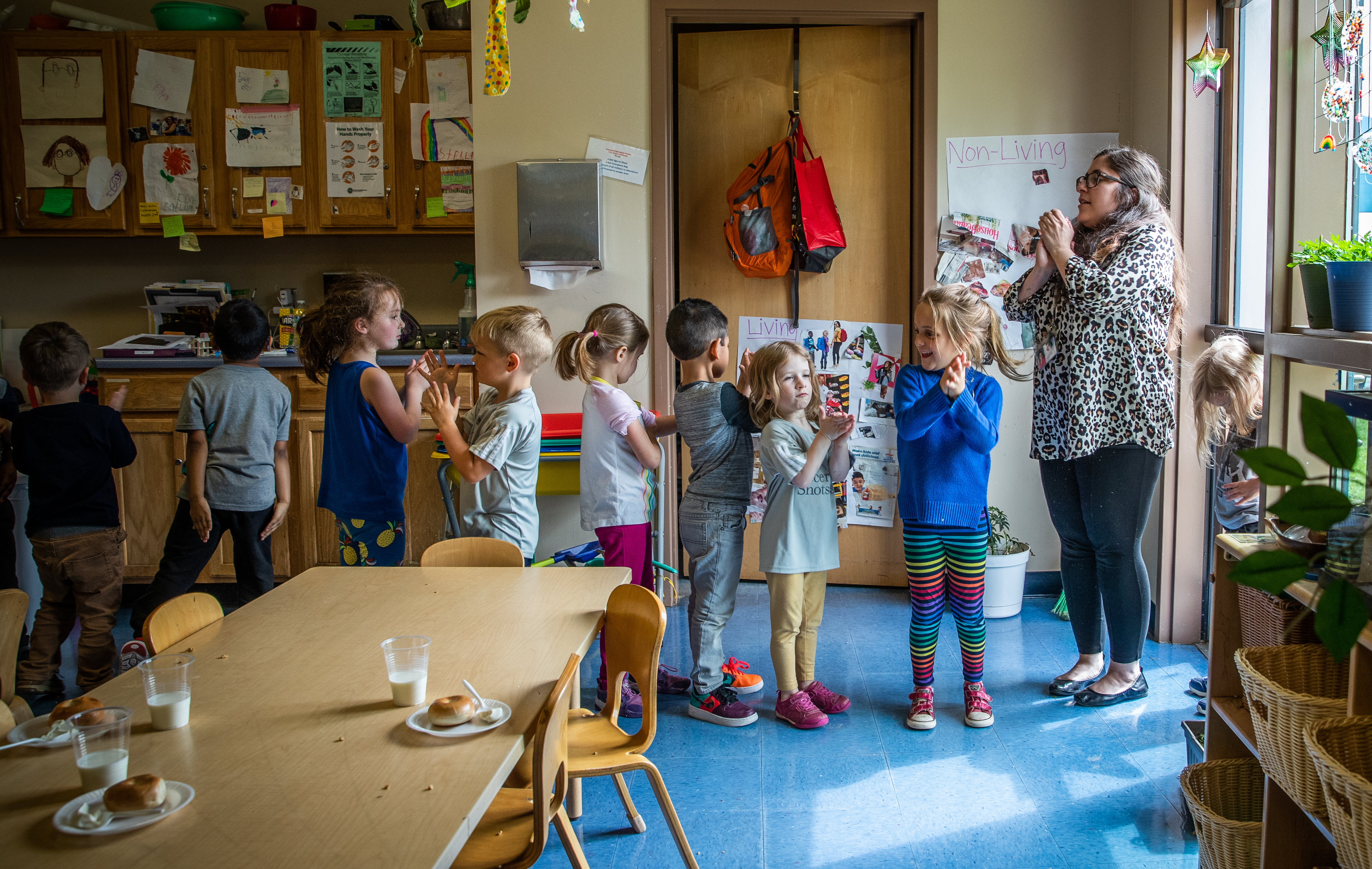 Pre-kindergarten lead teacher Elizabeth Dobrow (right) preps her class to line up before going outside to play at IU Health Day Early Learning Center in Indianapolis on Tuesday, May 14, 2019.