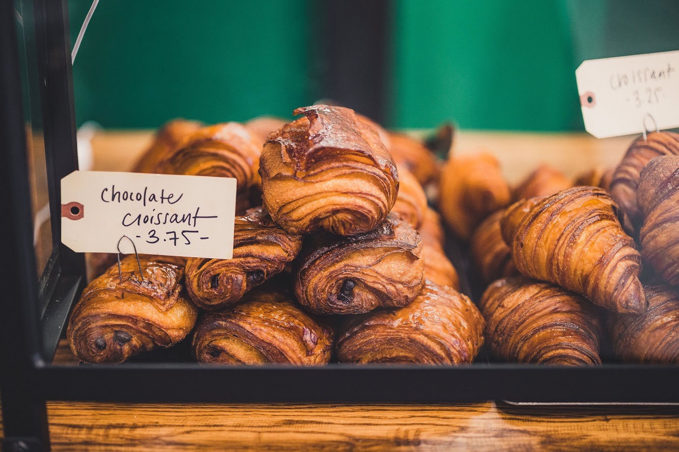 Fresh baked croissants in the the case at Evergreen Butcher and Baker in Kirkwood, Atlanta