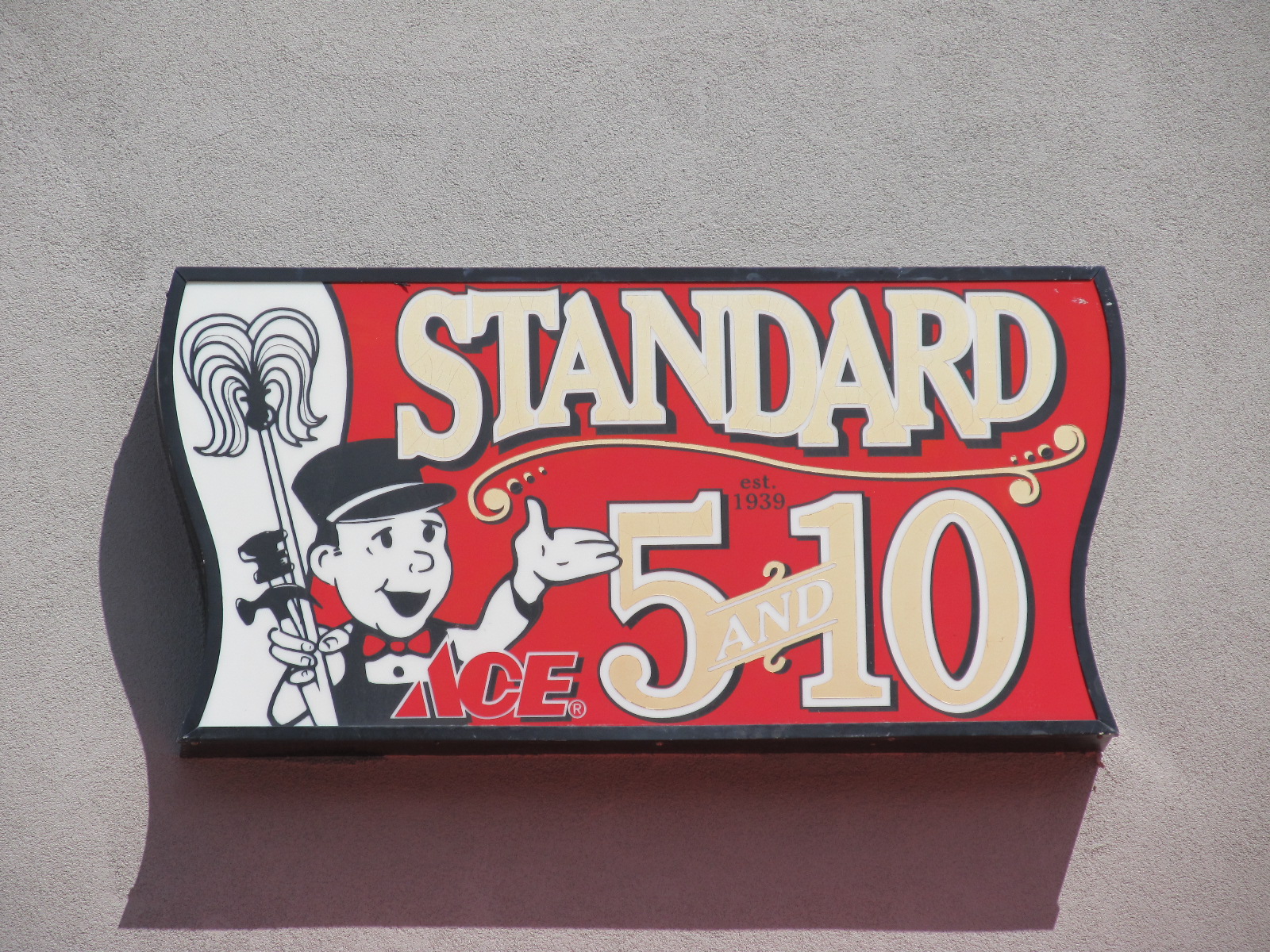 A sign reading “Standard 5 &amp; 10.”