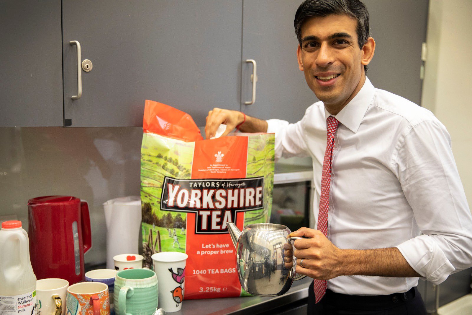 Chancellor Rish Sunak poses with a big bag of Yorkshire tea