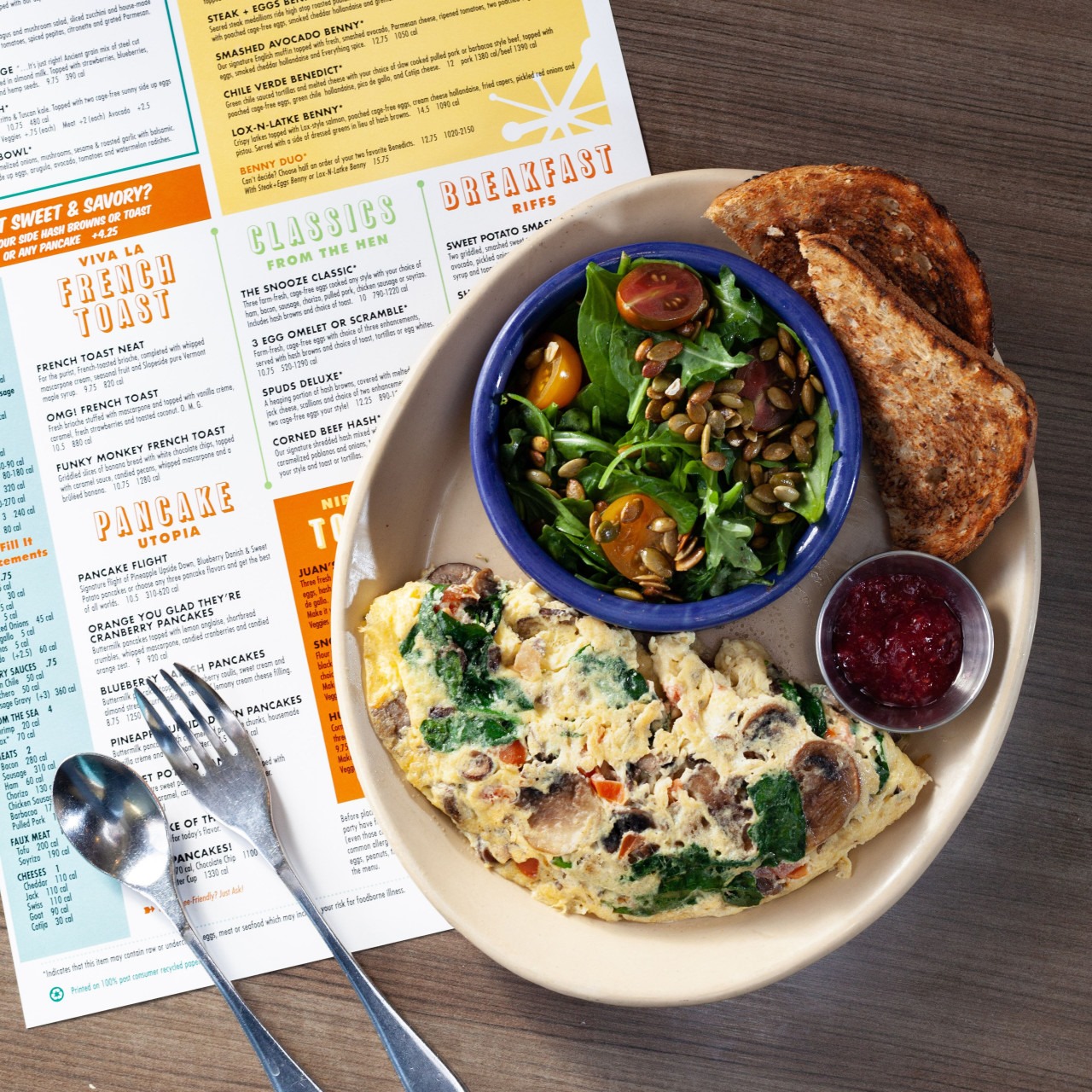 A vegetable omelette with a side salad and wheat toast at Snooze
