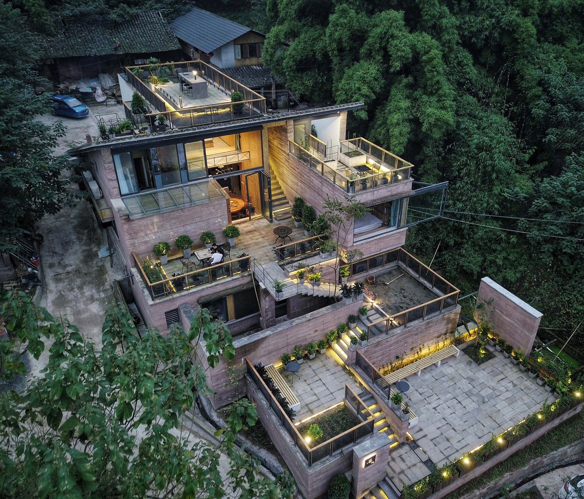 Aerial shot of house with terraces.