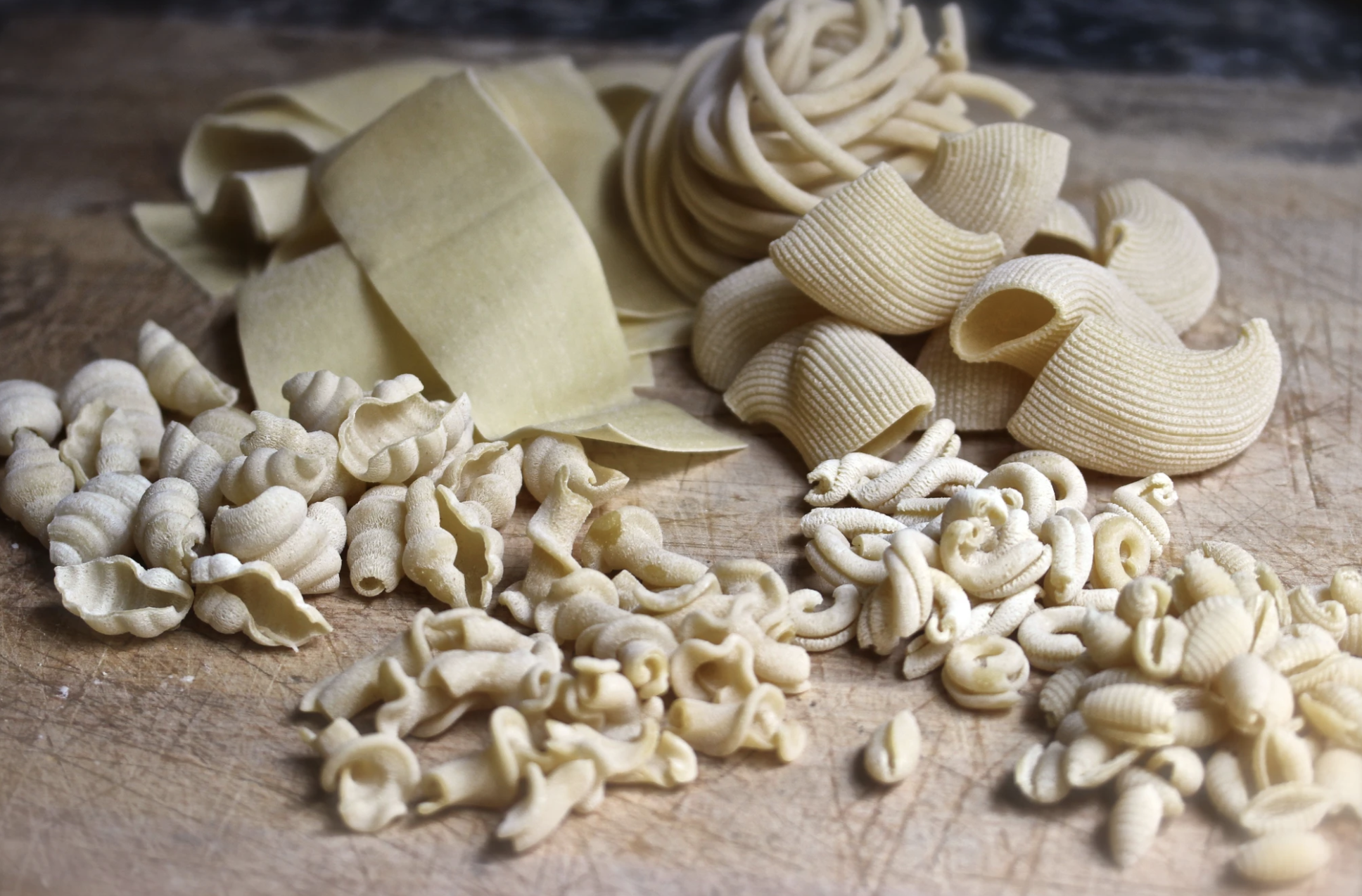 Freshly made pasta from Il Nido on a wooden counter