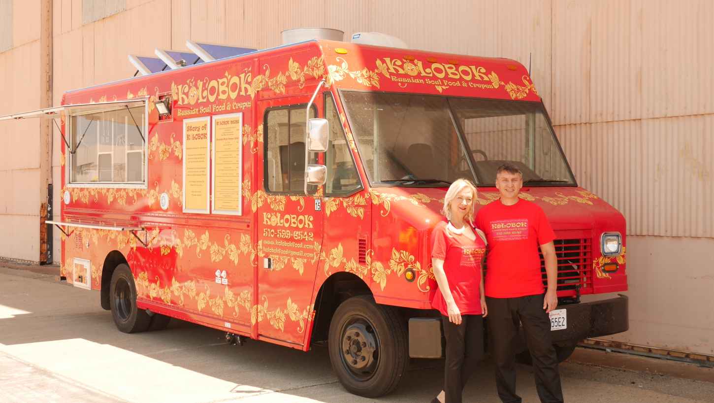Chefs Ellen Doren and Bulat Nasybulin Kolobok in front of their food truck, Kolobok Russian Soul Food Truck