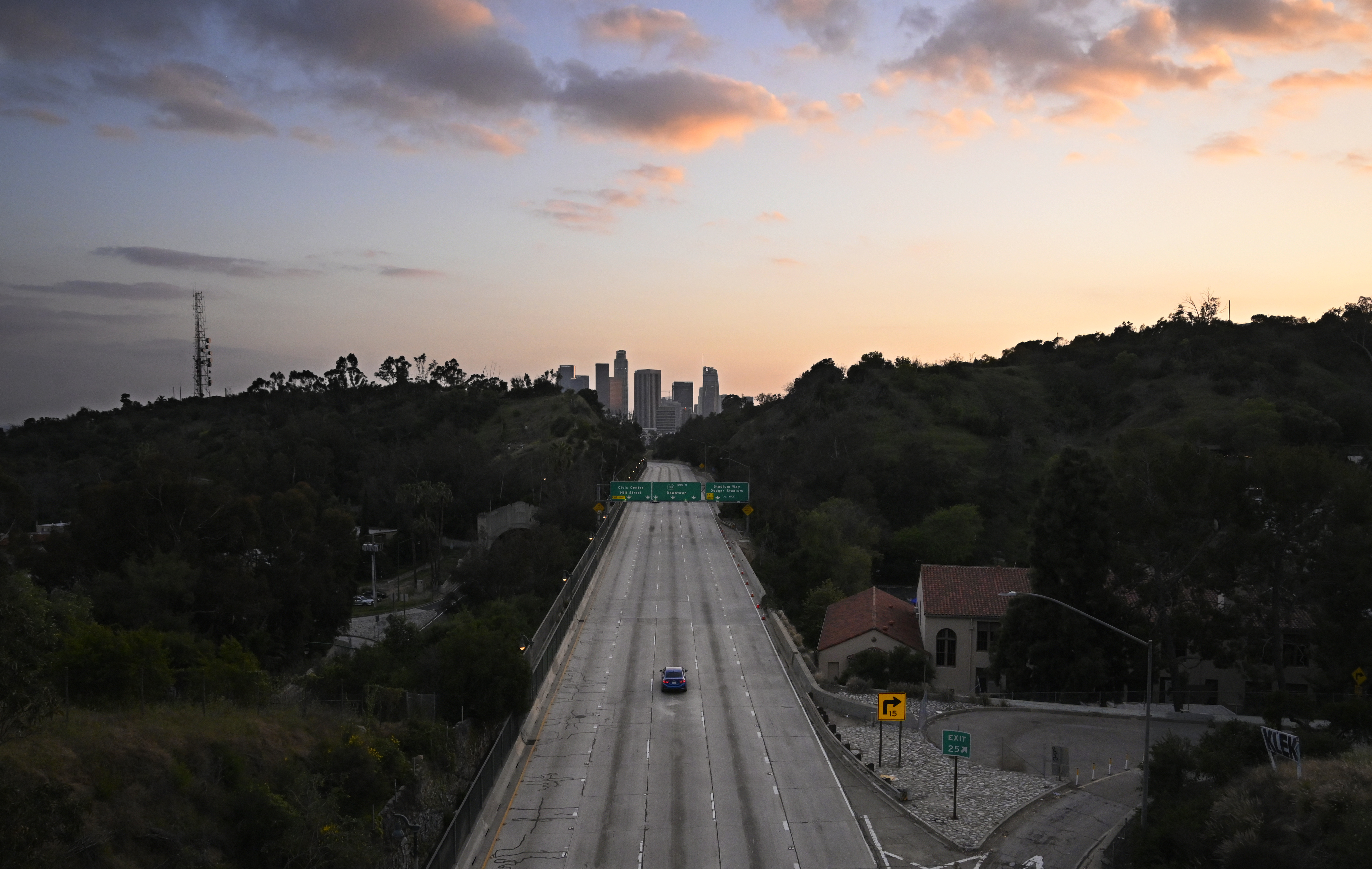 A photo of a highway near downtown Los Angeles with almost no traffic during rush hour on April 2, 2020.