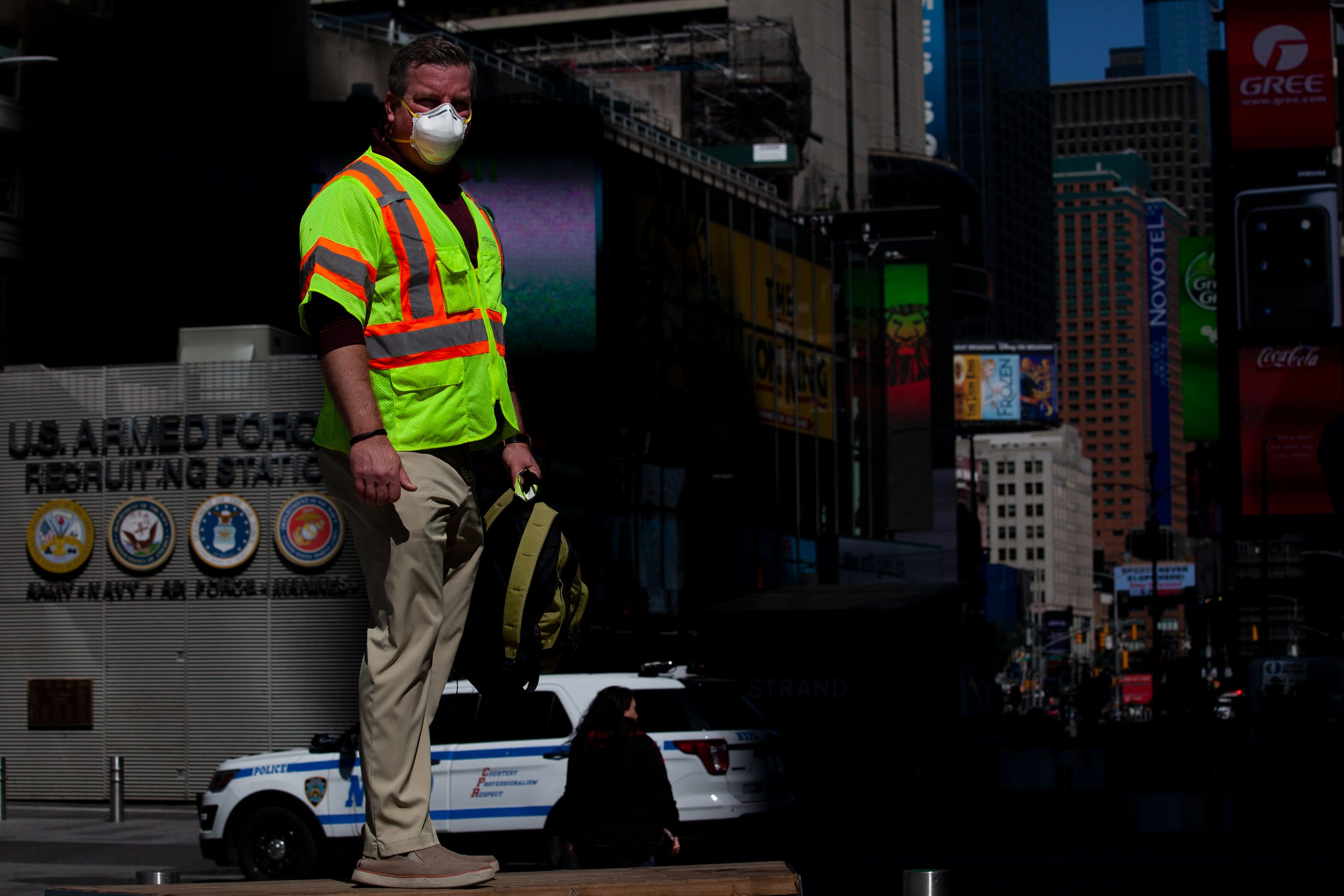 Construction waste recycling worker Sean Ragiel takes a break in Times Square after working at a job site.