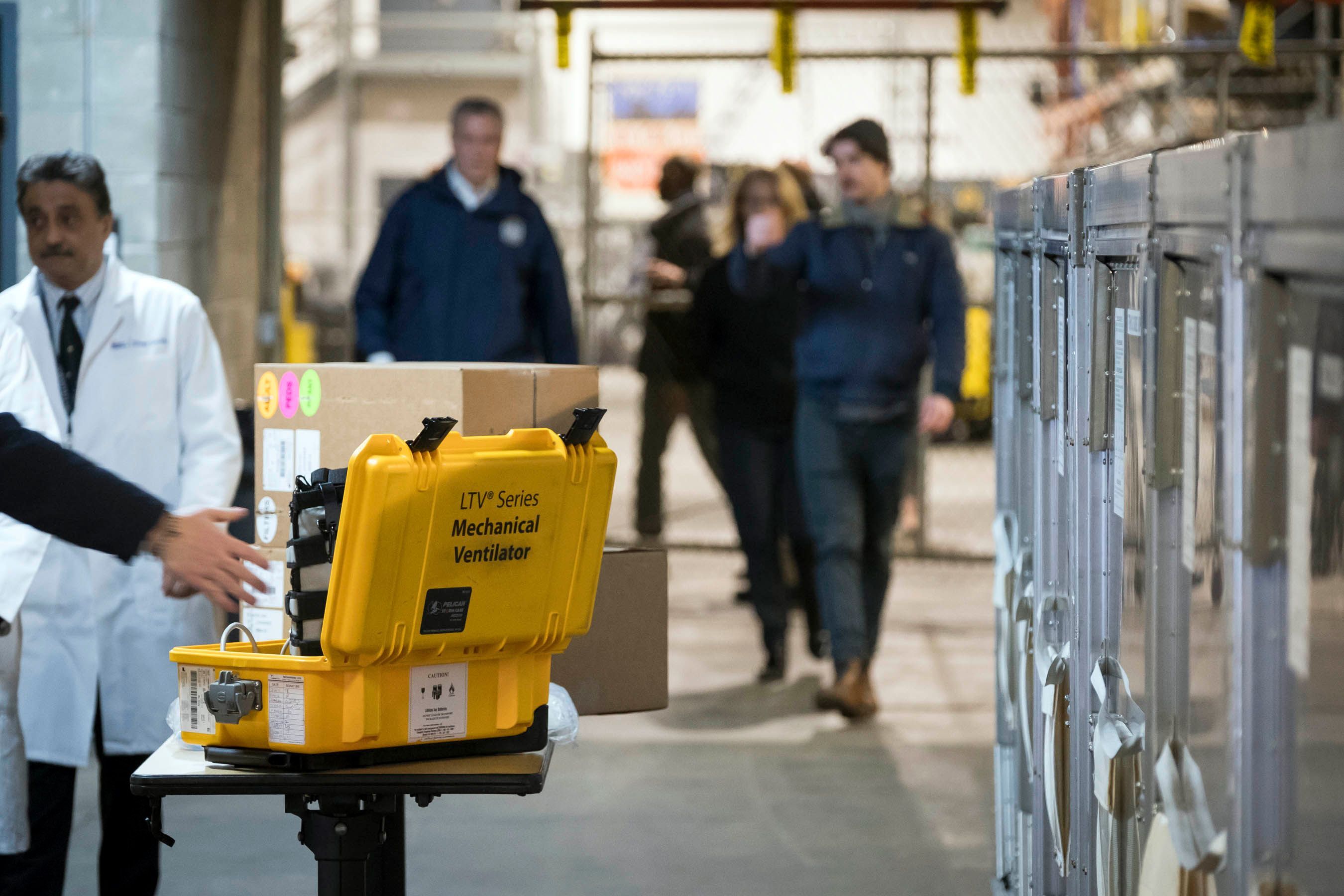 Mayor Bill de Blasio examines ventilators, which arrived at a New York City Emergency Management Warehouse, March 24, 2020.