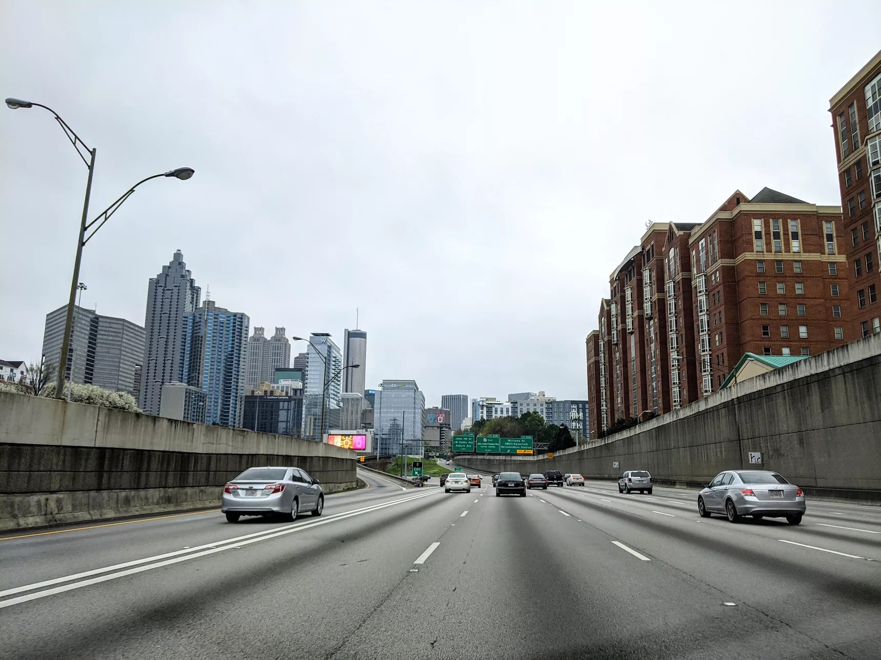 Hardly any traffic on Atlanta’s Downtown Connector, with Georgia Tech buildings to the right and Midtown and downtown high-rises to the left.