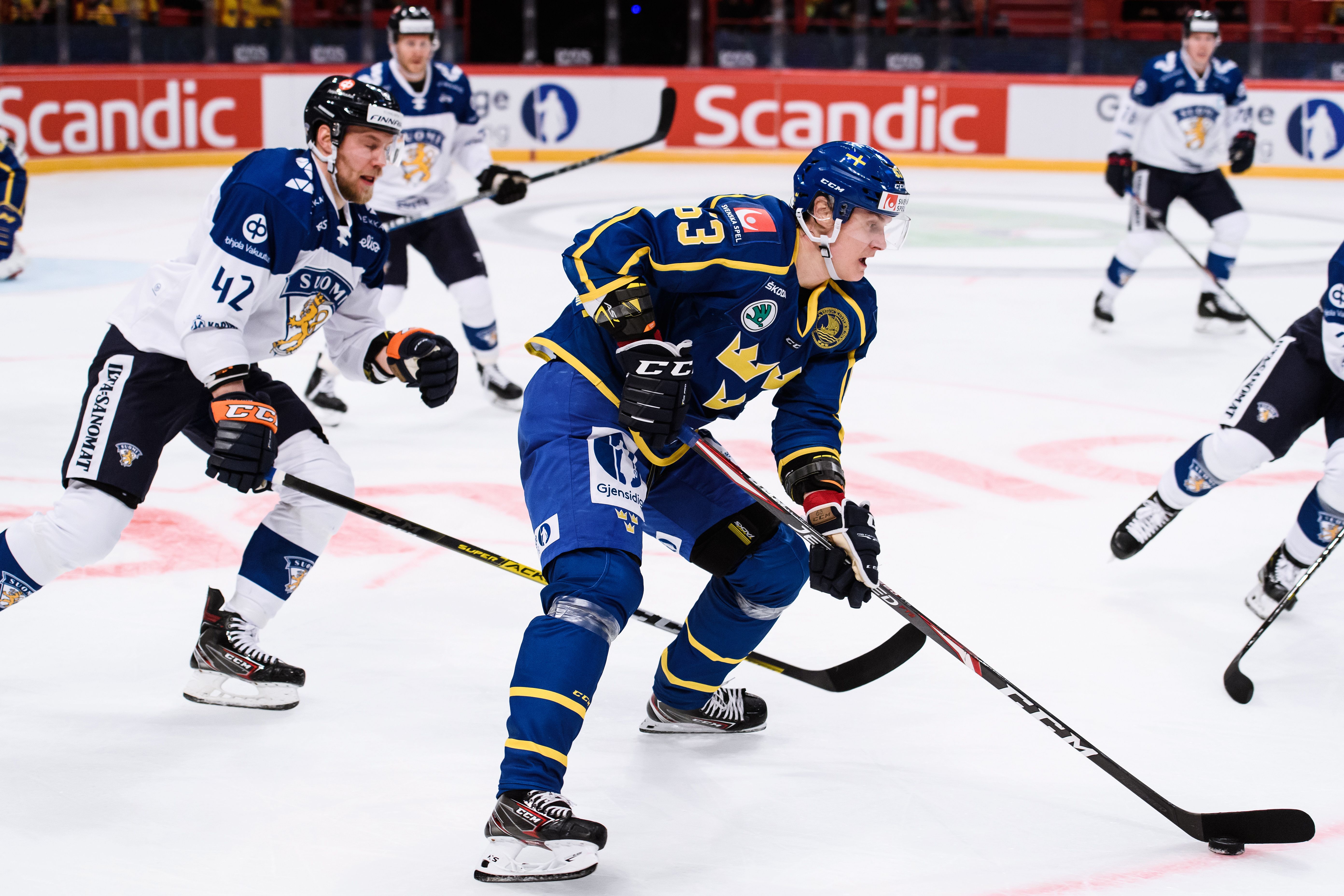 Sweden's Fredrik Handemark vies with Finland's Ilari Melart (L) during Beijer Hockey Games between Sweden and Finland at the Ericson Globe Arena in Stockholm, Sweden, on February 09, 2020.