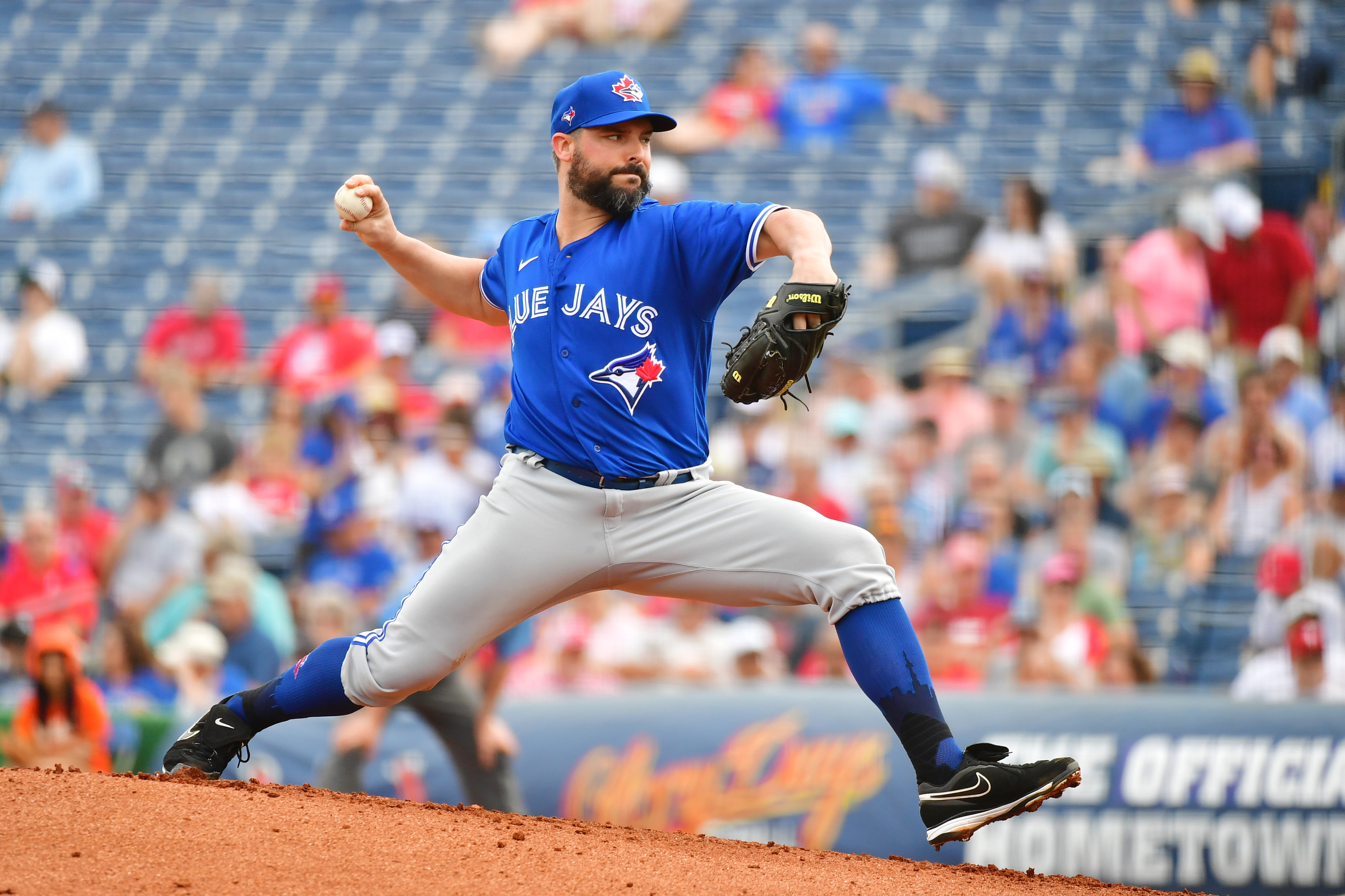 Tanner Roark #14 of the Toronto Blue Jays delivers a pitch during the first inning of a Grapefruit League spring training game against the Philadelphia Phillies&nbsp;