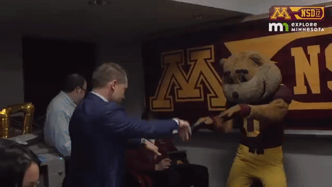 P.J. Fleck and Goldy dancing