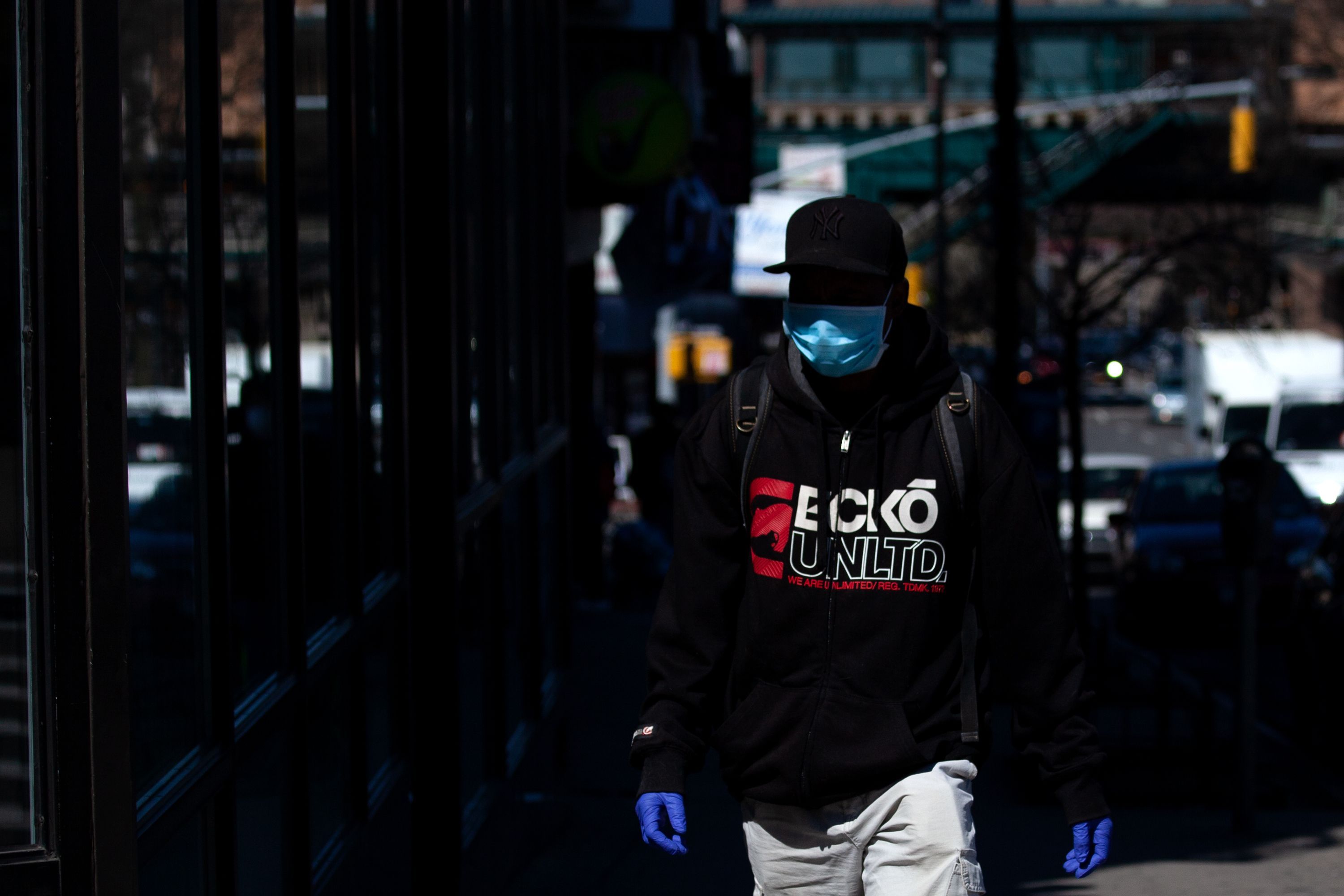 A man wears a mask in the South Bronx during the coronavirus outbreak.