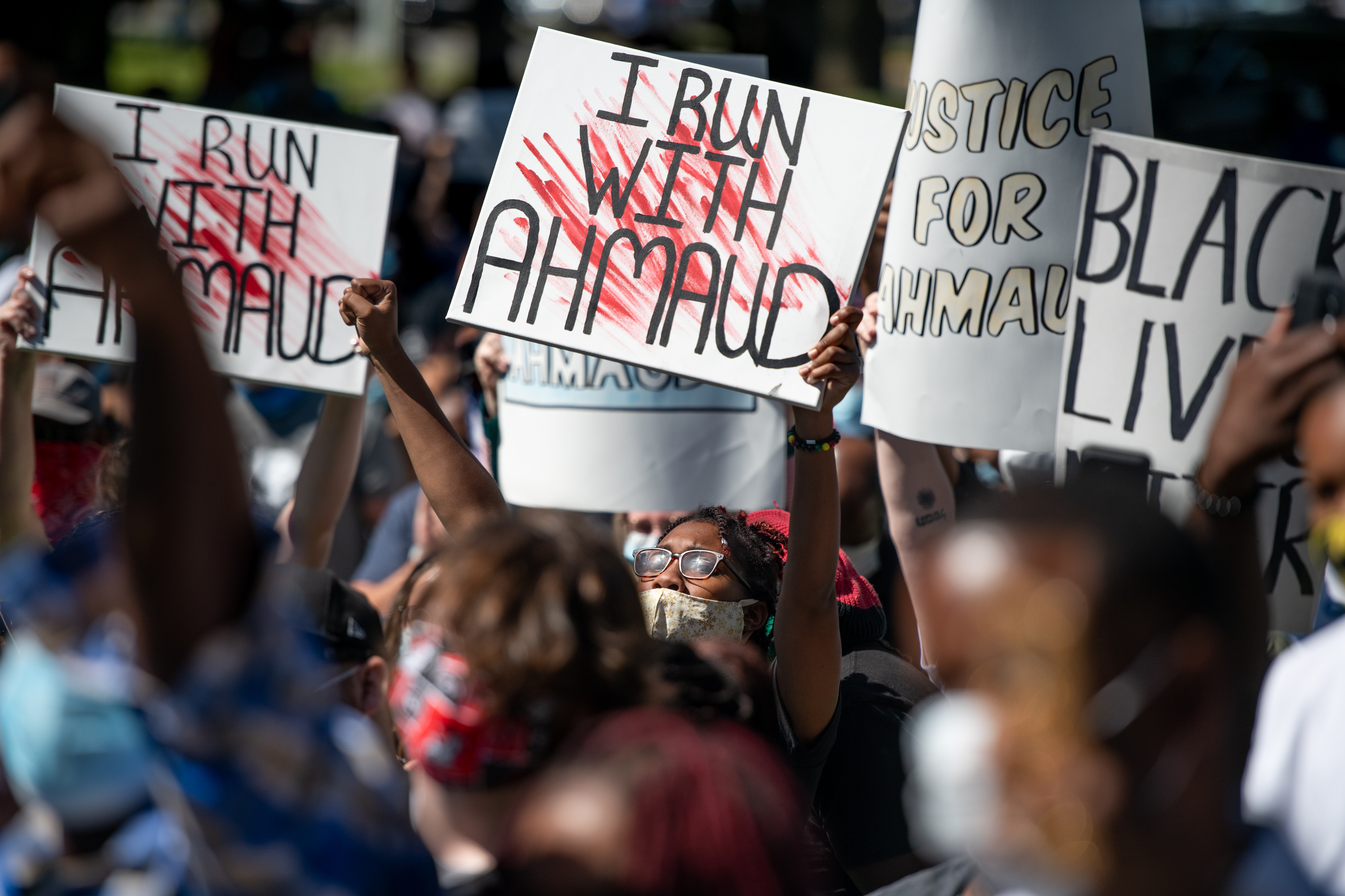 Demonstrators on May 8 protest the shooting death of Ahmaud Arbery at the Glynn County Courthouse in Brunswick, Georgia.