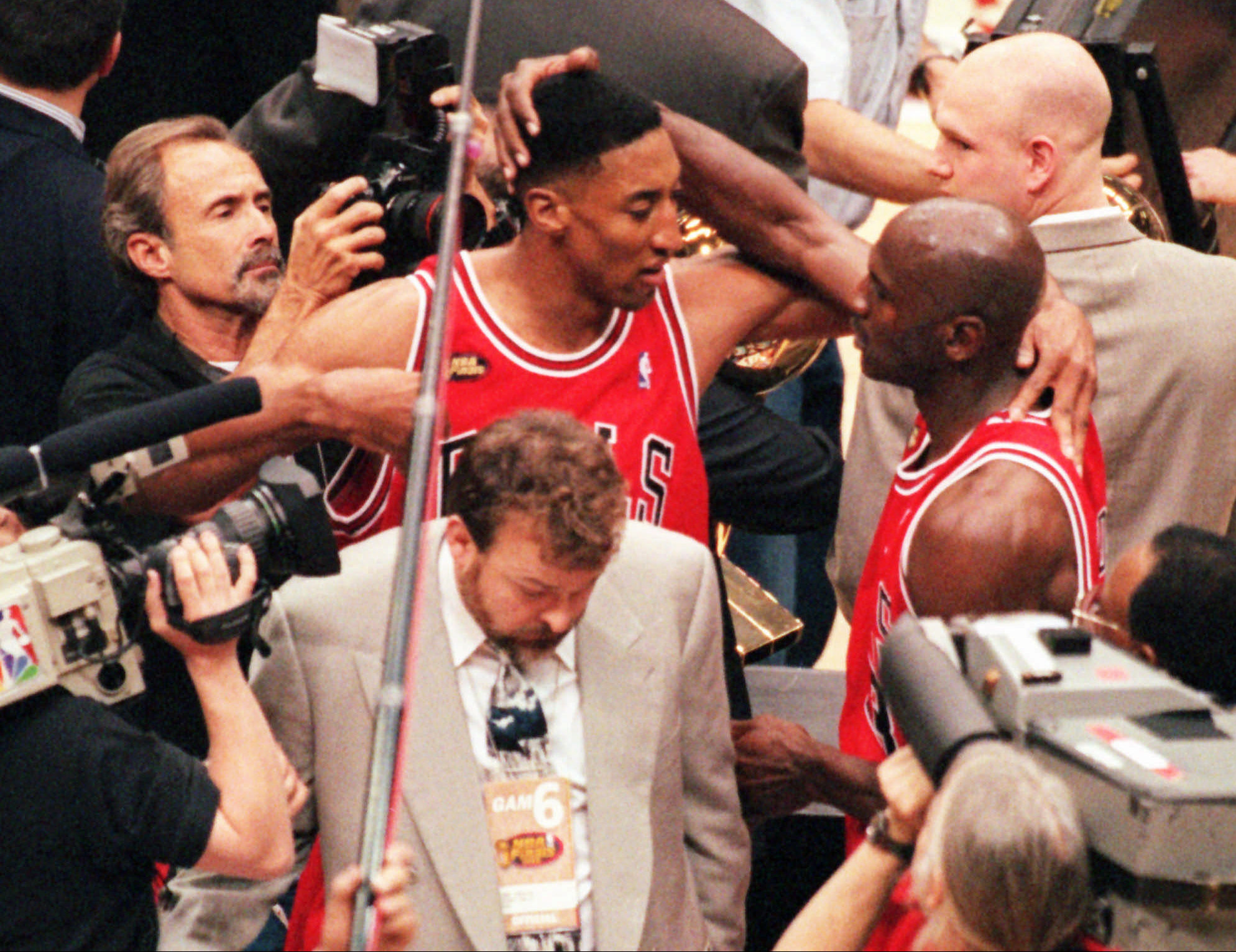 The Bulls’ Scottie Pippen, left, and Michael Jordan embrace after winning the 1998 NBA Finals. 