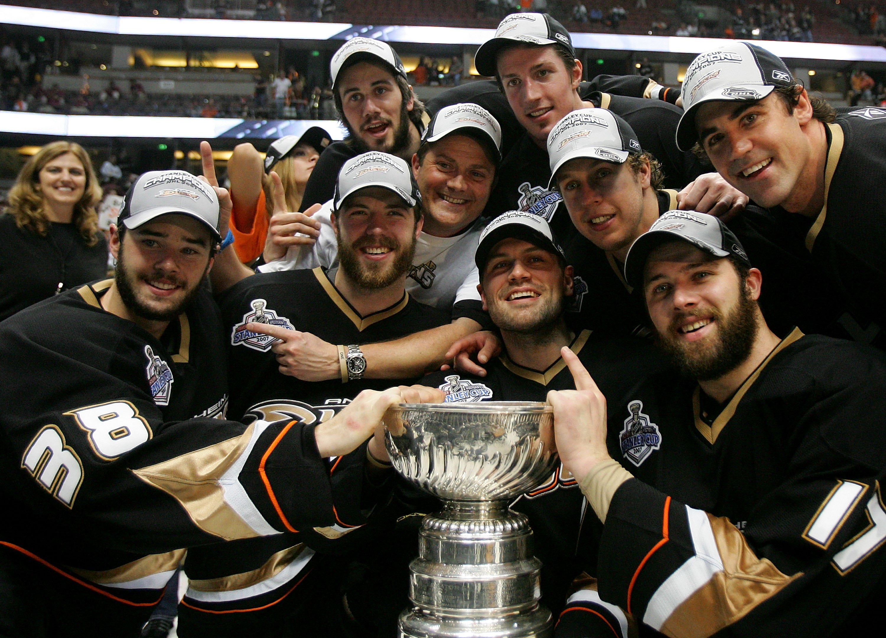 ANAHEIM, CA - JUNE 06: Members of the Anaheim Ducks pose with the Stanley Cup after their 6-2 victory over the Ottawa Senators in Game 5 of the Stanley Cup Final June 6, 2007 at Honda Center in Anaheim, California.
