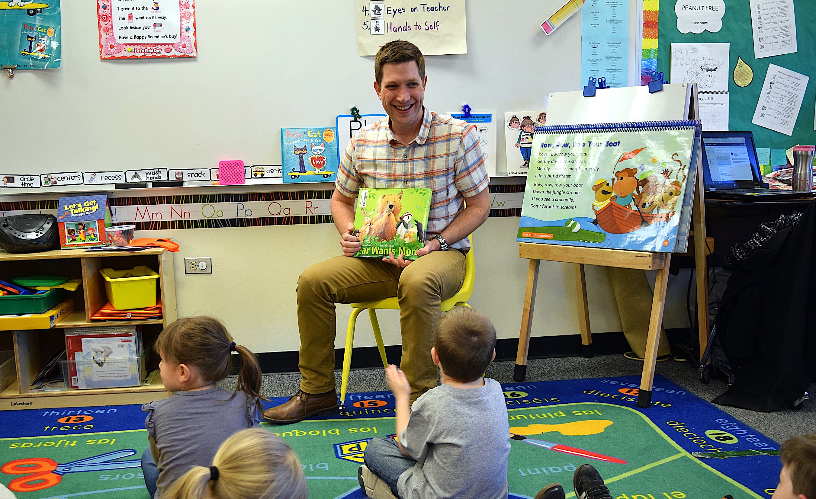 Dan Haught, a speech-language pathologist at Mesa Elementary School in Westminster Public Schools, with children in a preschool classroom.