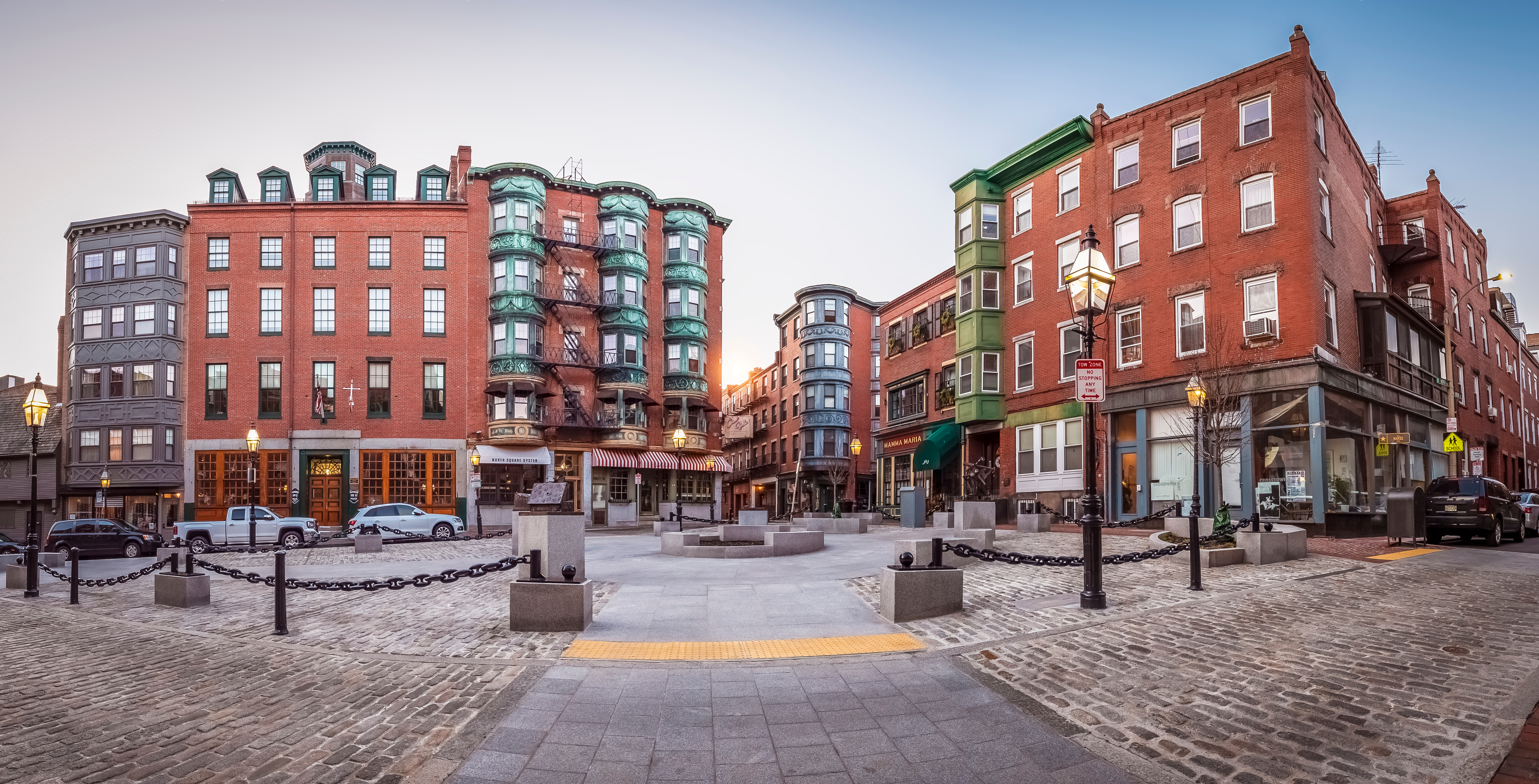 A wide shot, outdoors, of one of Boston’s oldest neighborhoods, showing the architecture and empty streets