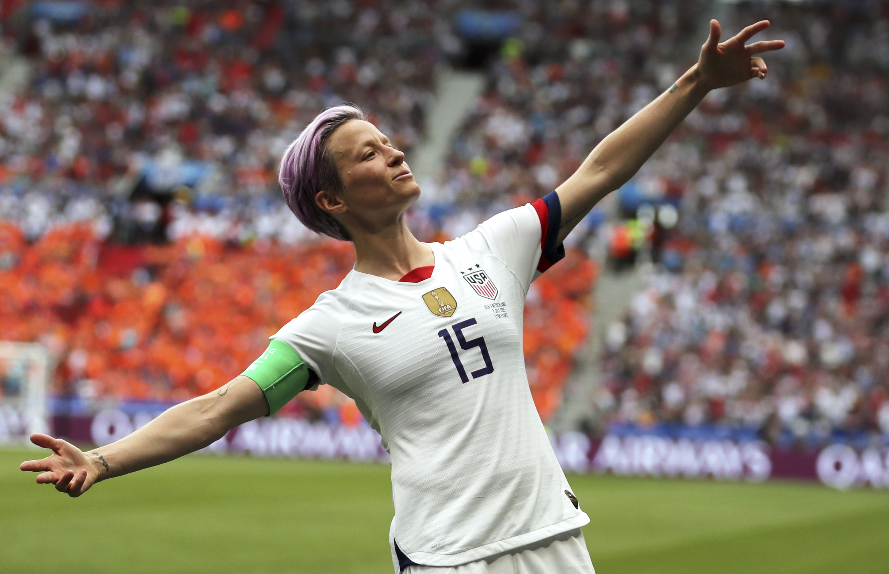 Megan Rapinoe celebrates after scoring the opening goal from the penalty spot during the Women’s World Cup final soccer match between US and The Netherlands at the Stade de Lyon in Decines, outside Lyon, France, Sunday, July 7, 2019.