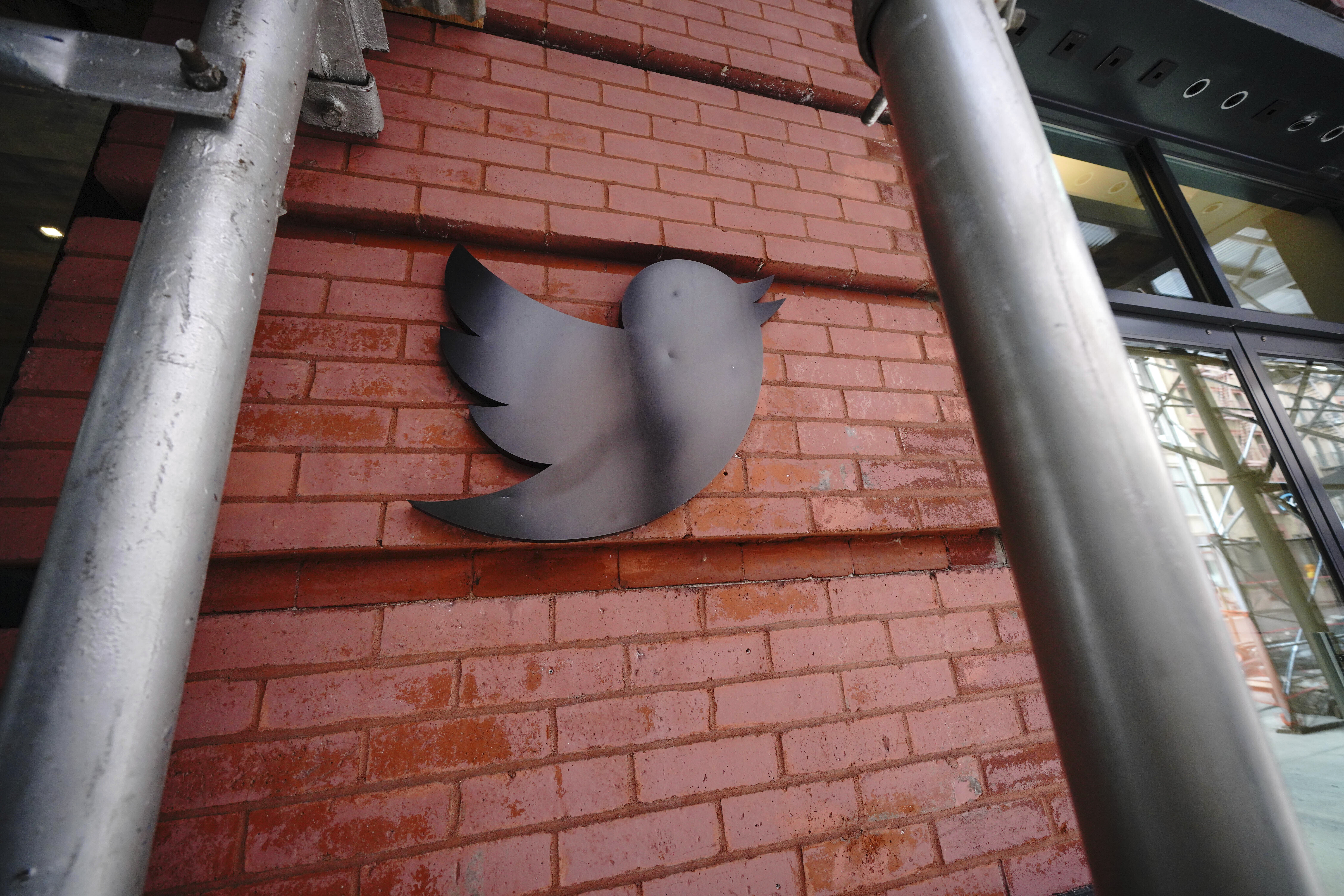 The Twitter bird icon on a brick wall outside Twitter’s New York office.