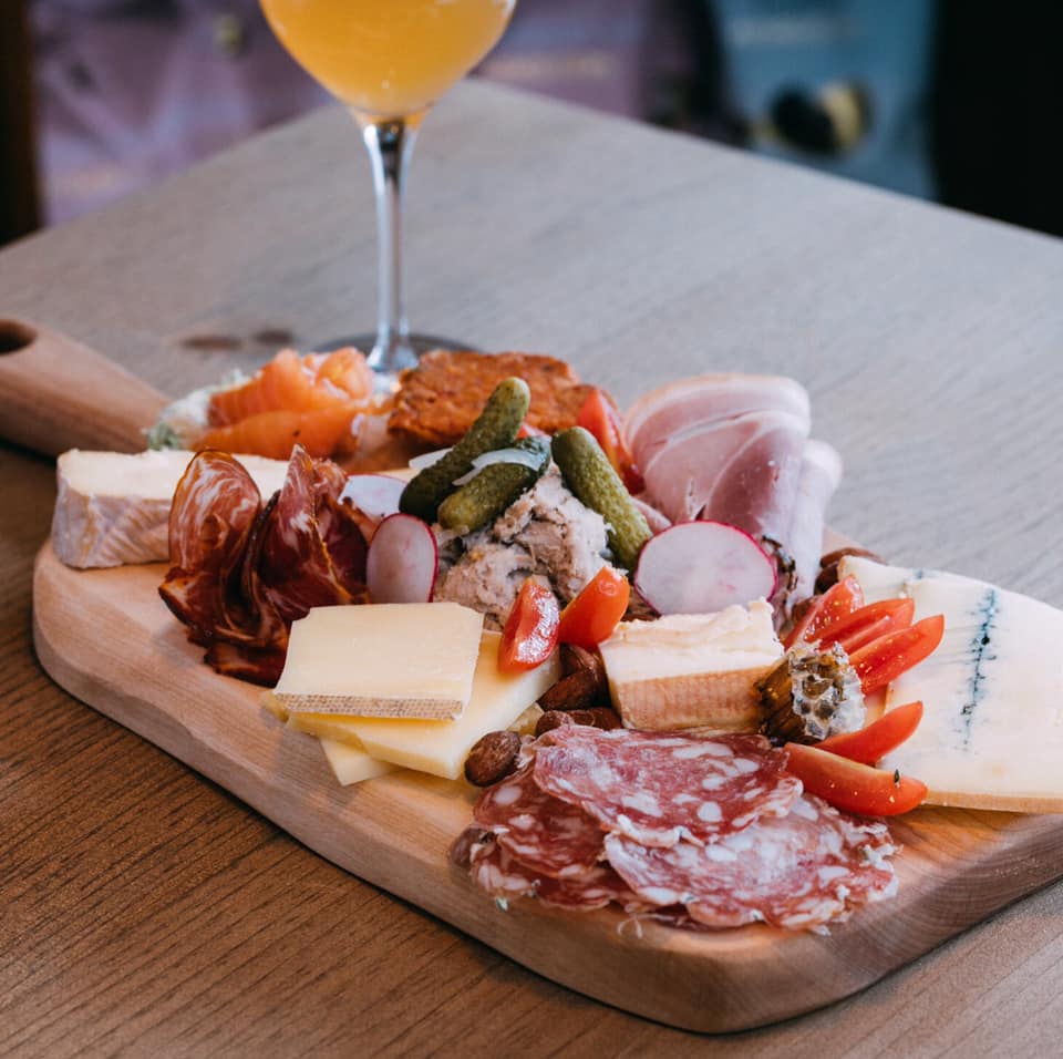 A plate of charcuterie and cheese.