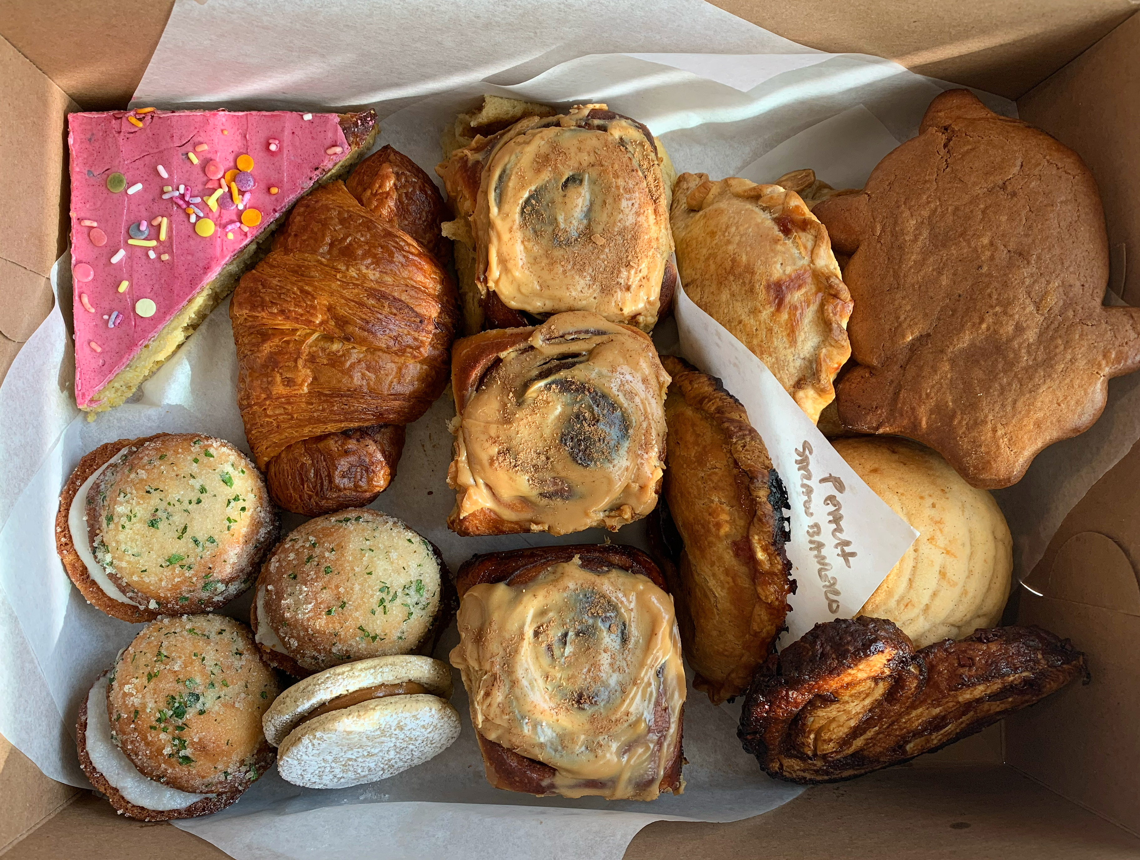 A box of baked goods from Comadre Panaderia  