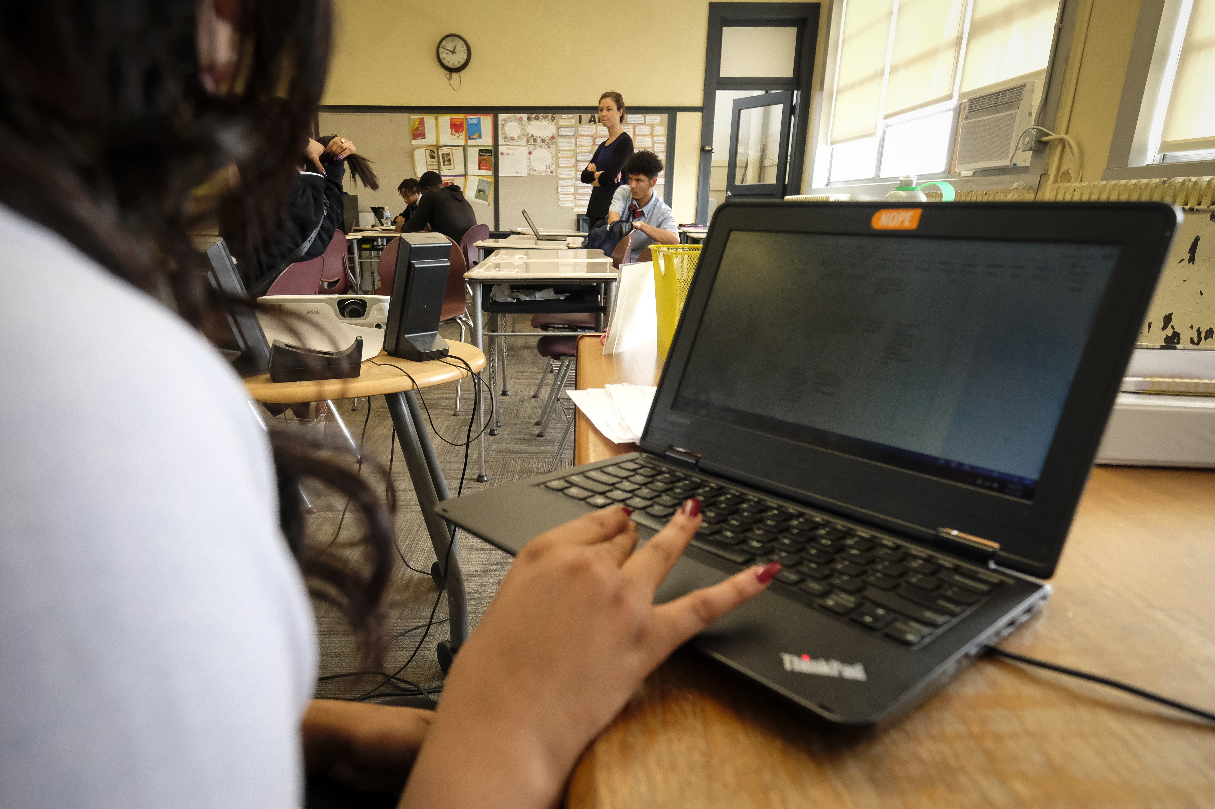 A student in a classroom uses a laptop computer at a private high school in Indianapolis, Indiana.