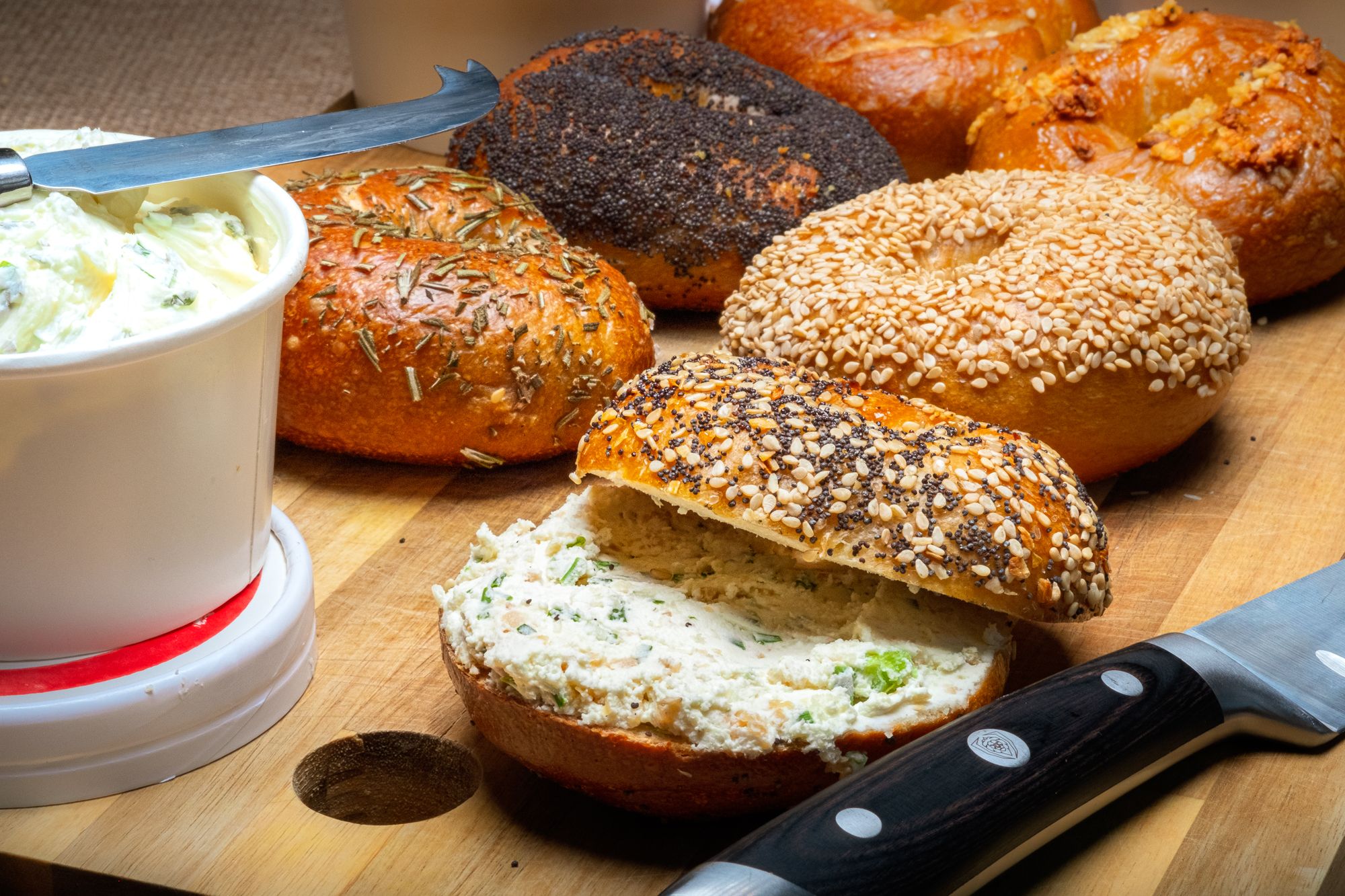 A selection of offerings from Rubinstein Bagels, including an everything variety smeared with cream cheese