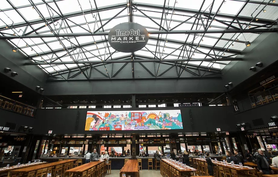 Time Out Market’s space features multiple food vendors, a full-service bar, and a massive skylight.