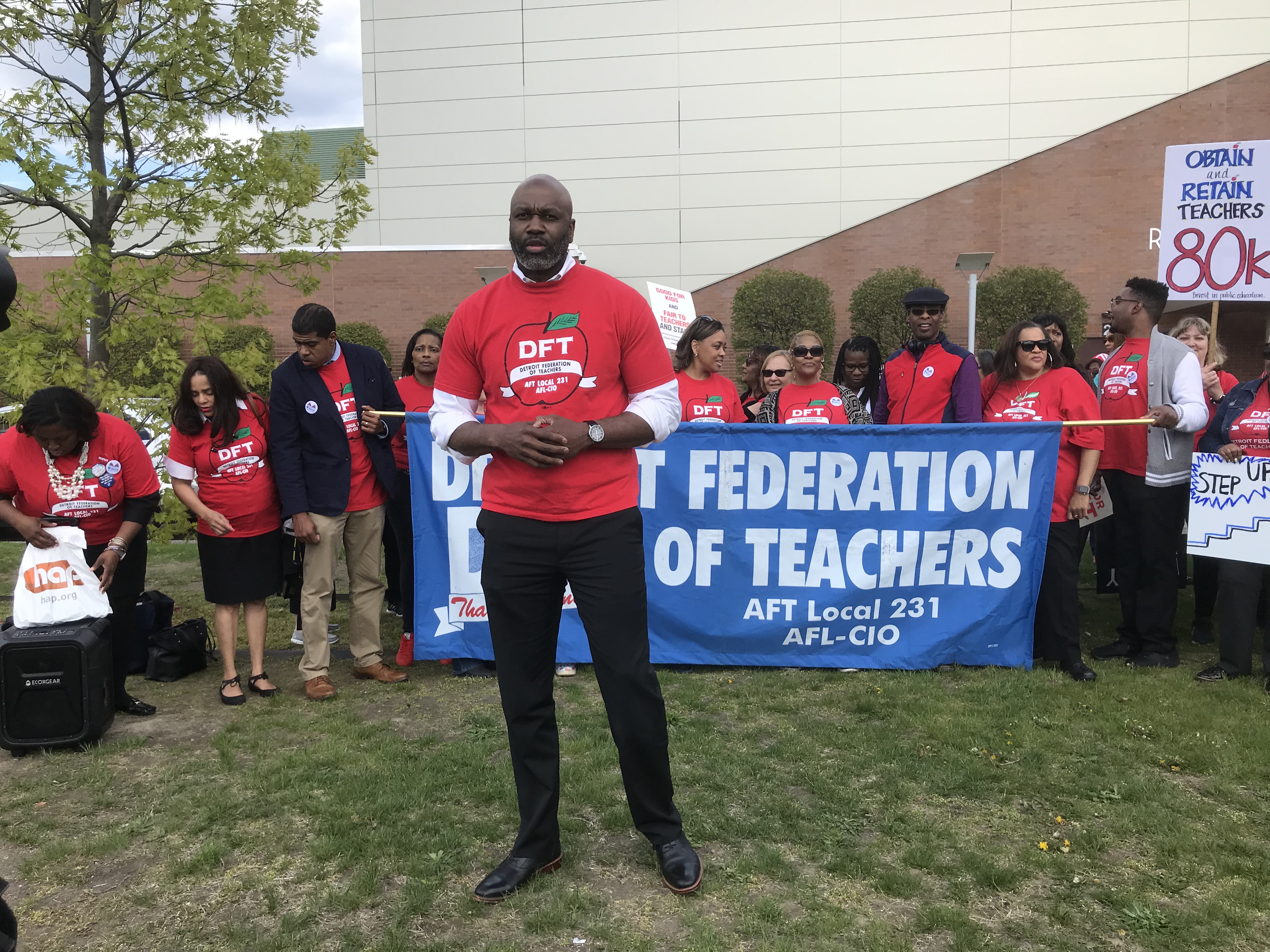 Terrence Martin, president of the Detroit Federation of Teachers, speaks during a demonstration outside Renaissance High School