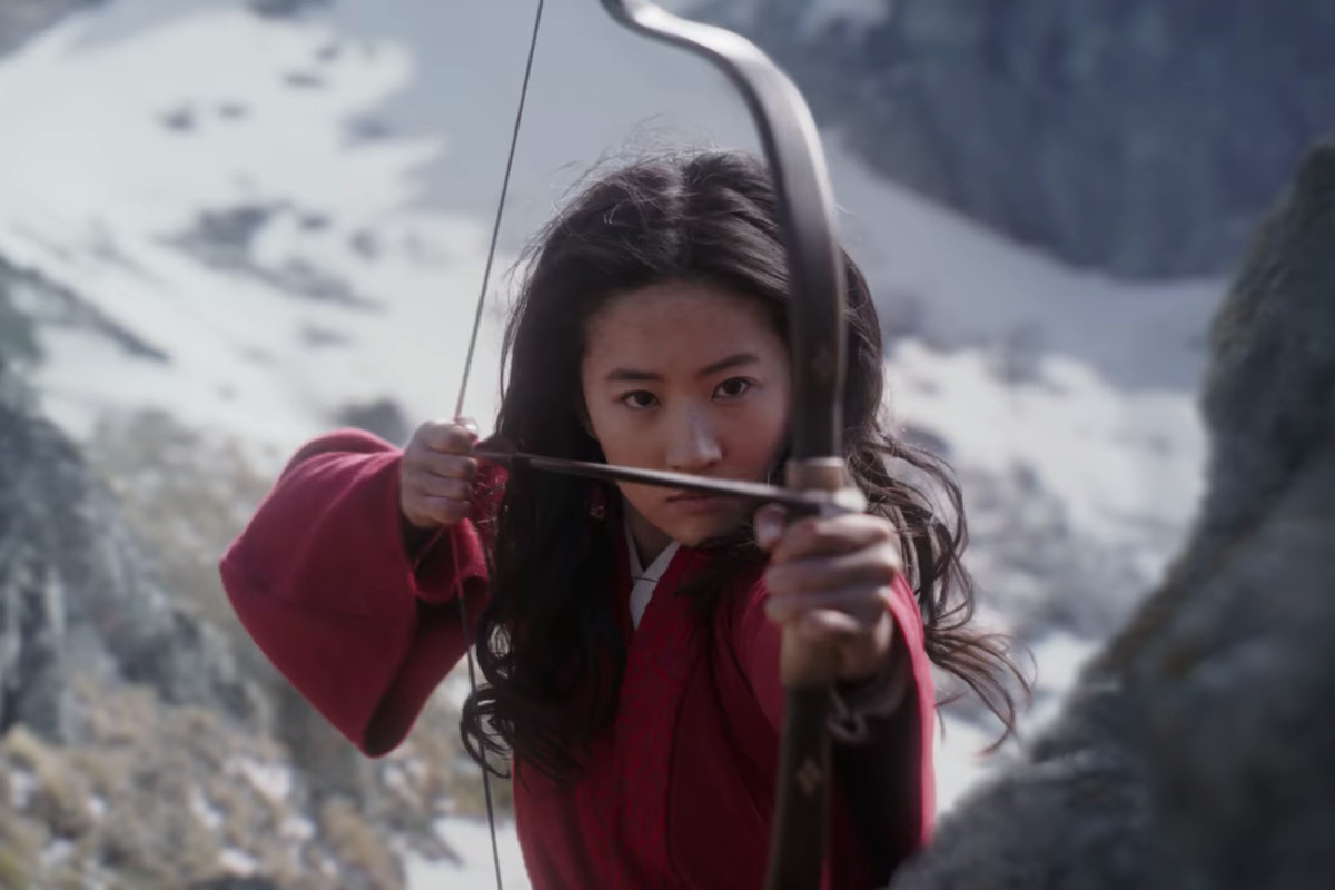 Liu Yifei shoots an arrow from a bow in Mulan.