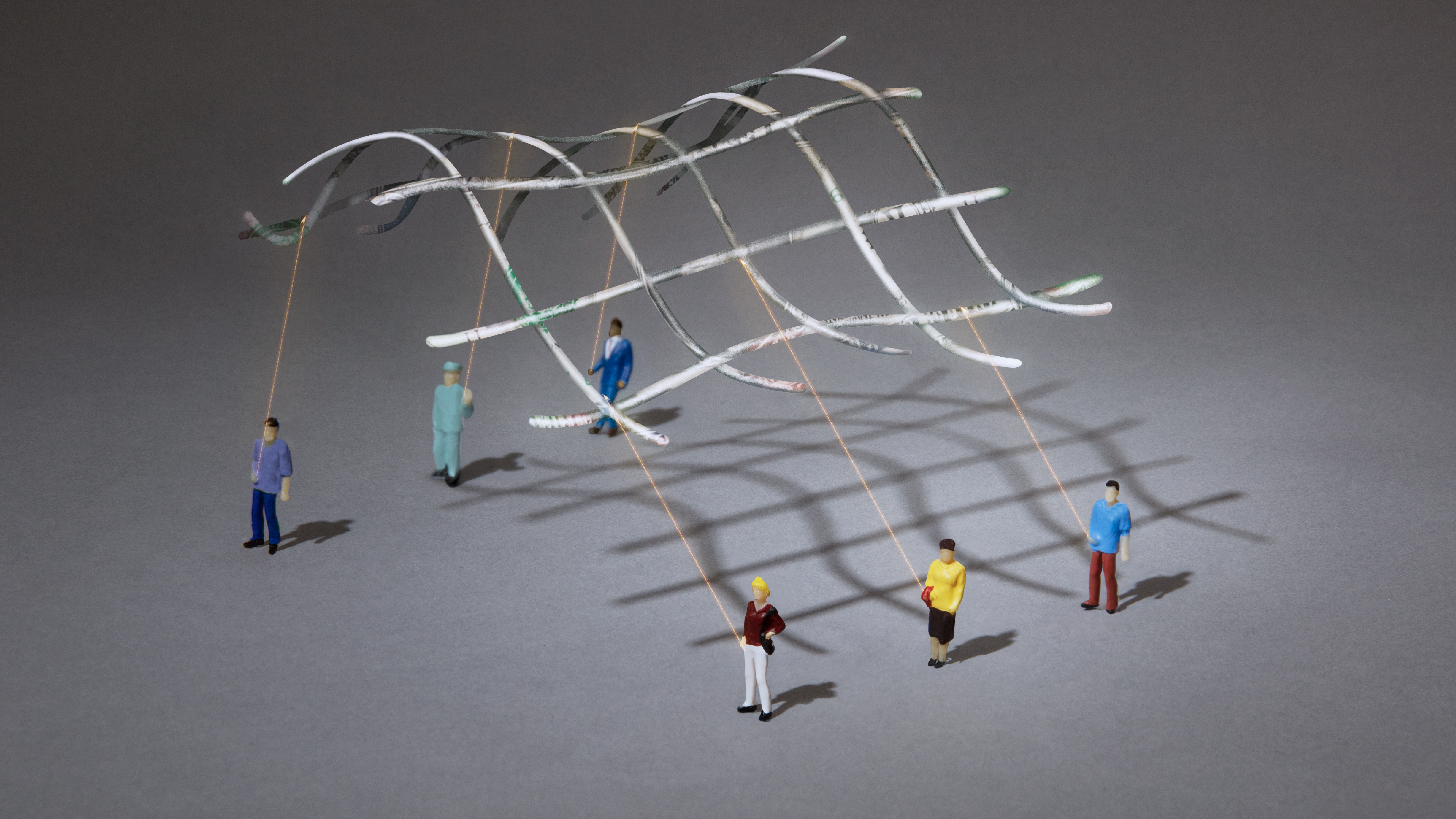 Illustration of people holding strings to a floating, glowing grid