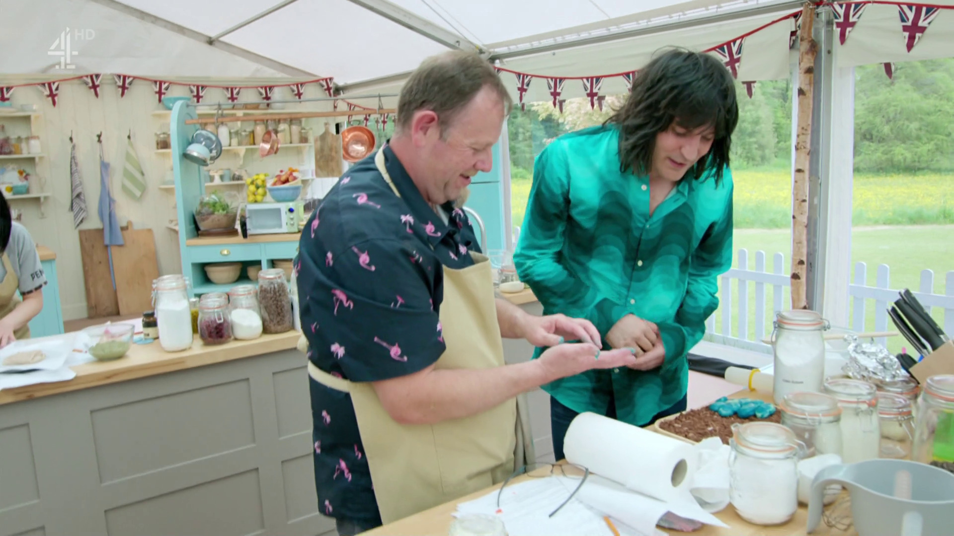 Great British Bake Off’s Noel Fielding assists a baker on Channel 4