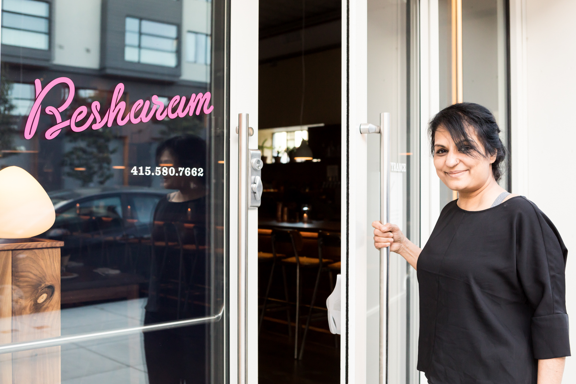 The chef Heena Patel standing outside of her restaurant Besharam in May 2018
