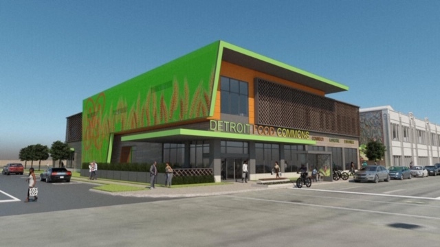 An illustration of two-story, modern building with a bright-green and orange exterior.