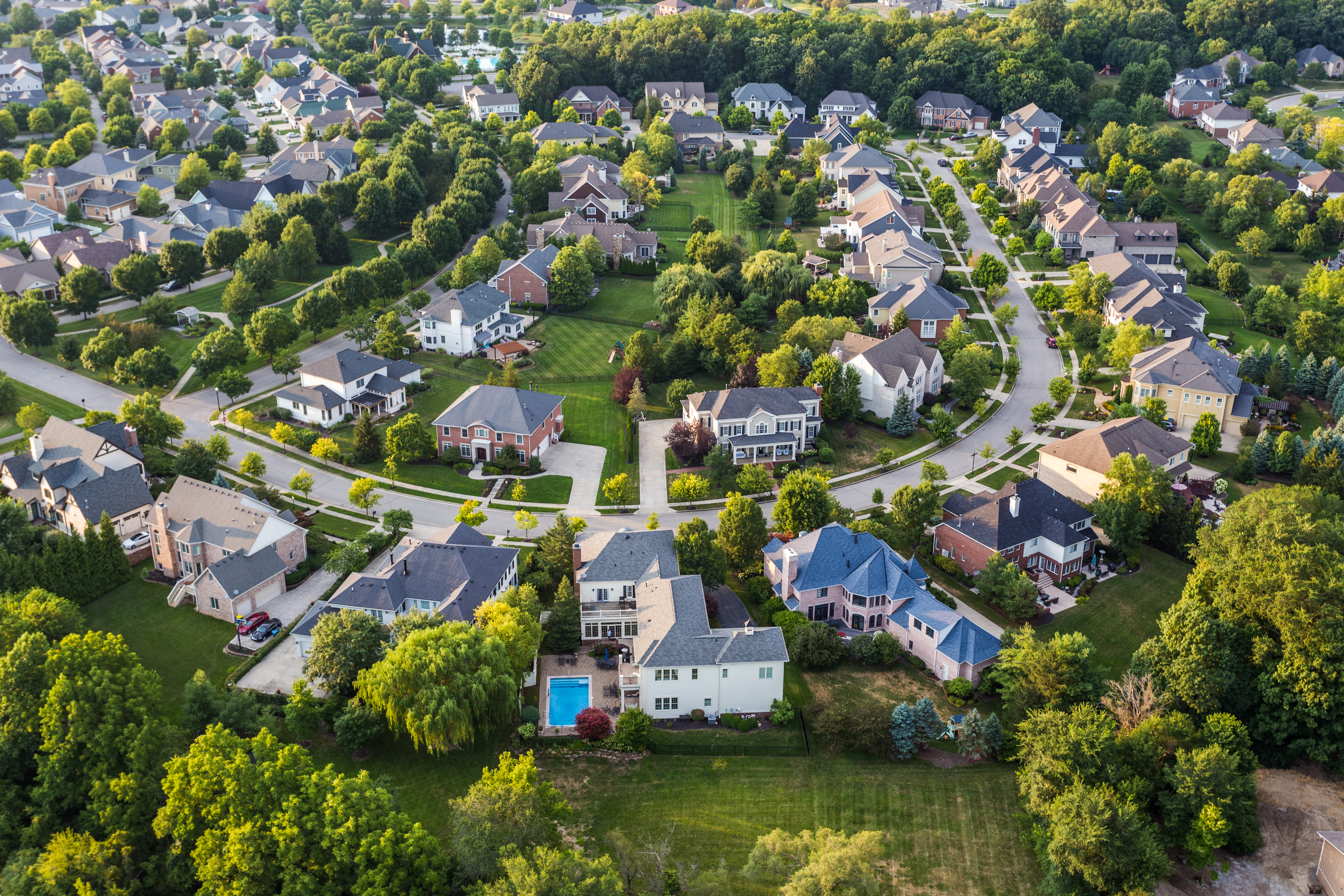 An aerial view of a suburban housing tract.