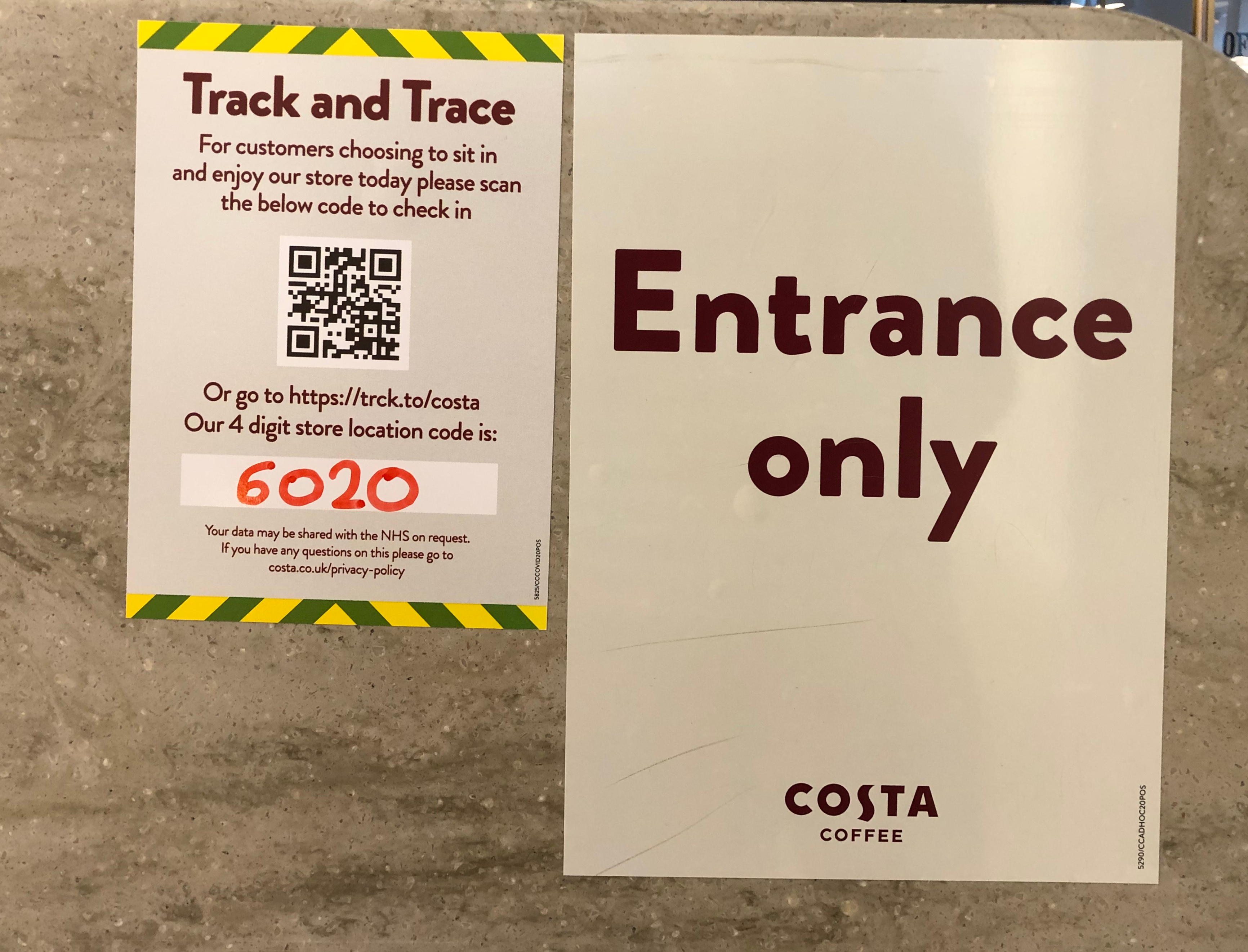 UK, July 18, 2020. Customer notice at the entrance of a coffee shop explaining how they can use the Track and trace to ensure they are informed of coronavirus infection 