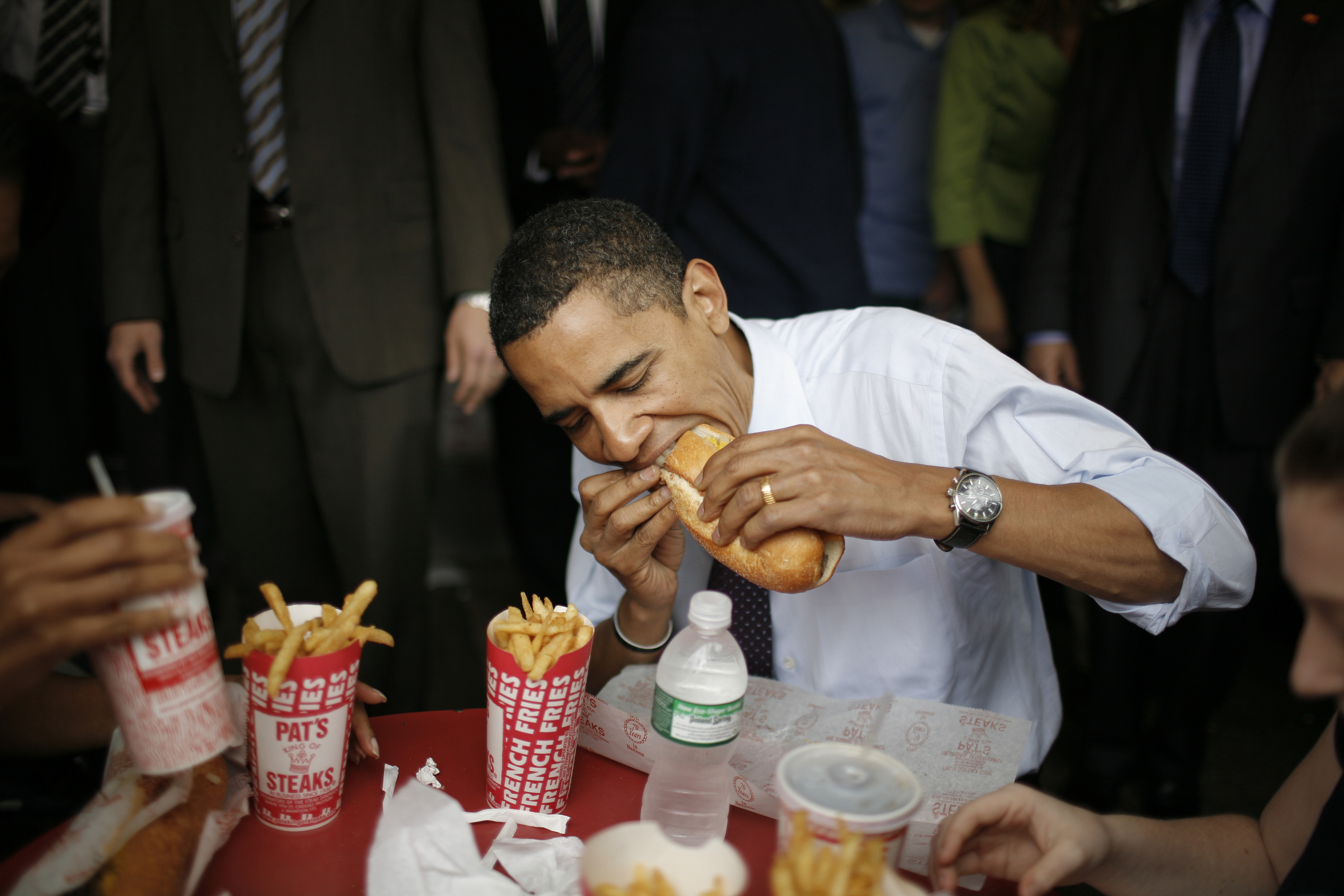 Democratic presidential candidate Senator Barack Obama and his wife Michelle eat a cheesesteak and fries during a campaign stop at Pat’s King of Steaks April 22, 2008 in Philadelphia, Pennsylvania.