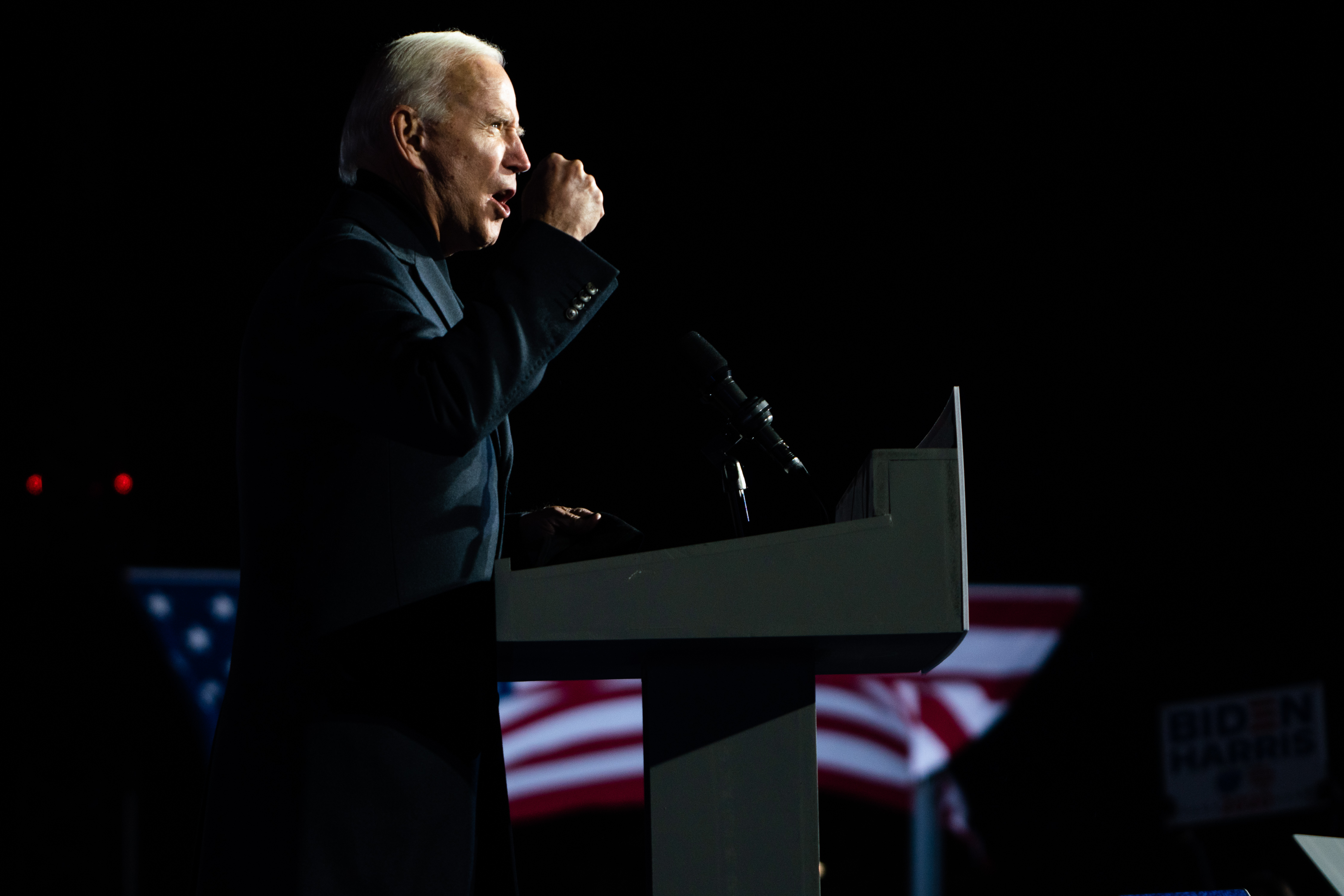 Joe Biden speaking from a podium.