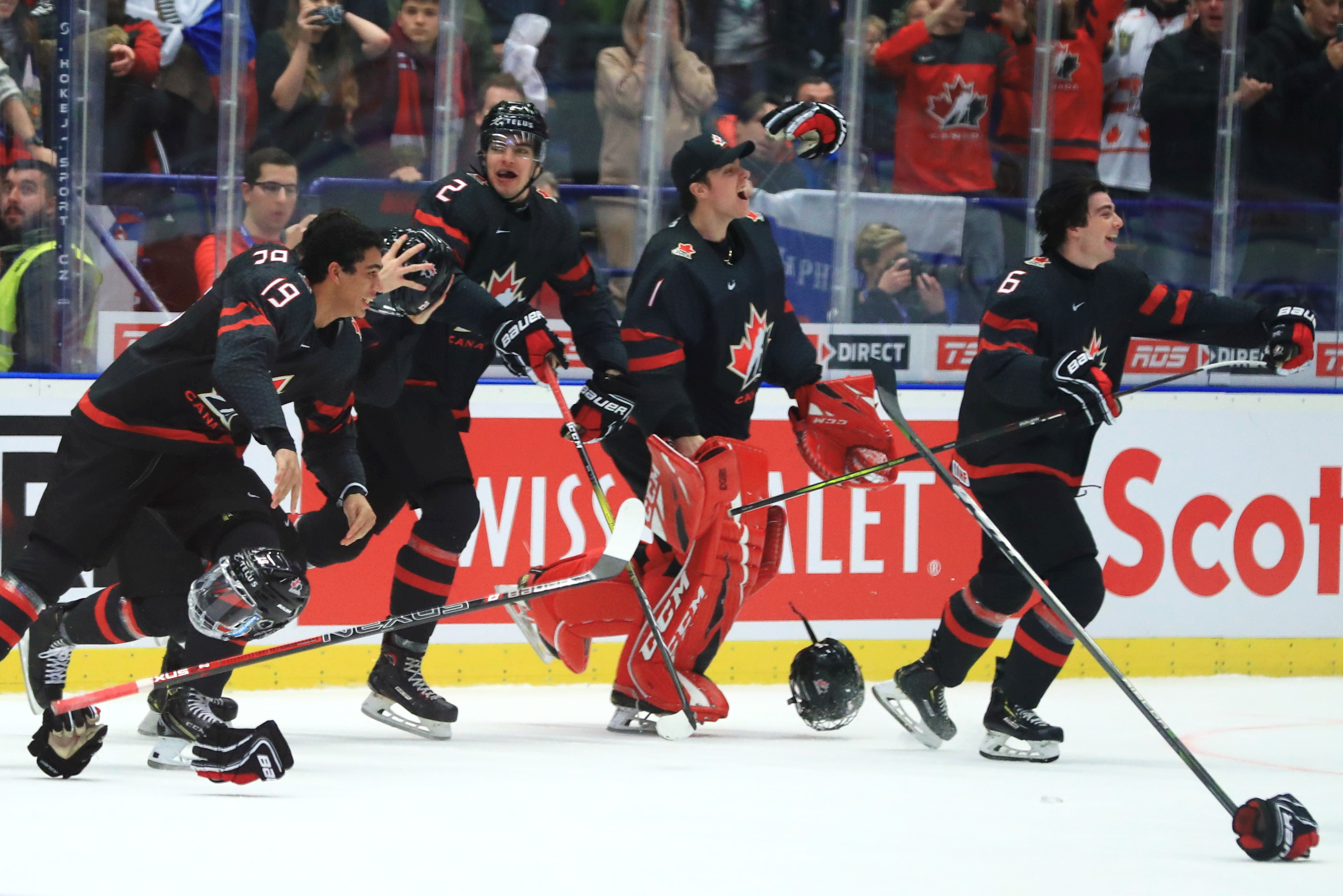 Canada’s Quinton Byfield, Kevin Bahl, Nicolas Daws, and Jamie Drysdale (L-R) celebrate victory in the 2020 World Junior Ice Hockey Championship final match between Canada and Russia at Ostravar Arena; Canada won 4-3.