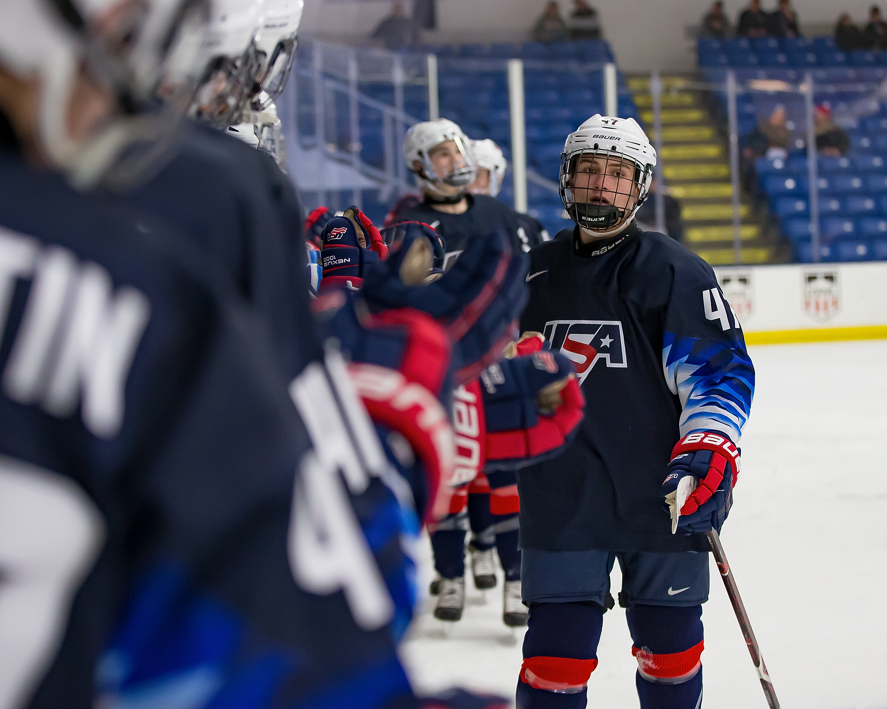 Thomas Bordeleau #47 of the U.S. Nationals celebrates a second period goal with teammates on the bench against the Switzerland Nationals during day-2 of game two of the 2018 Under-17 Four Nations Tournament at USA Hockey Arena on December 12, 2018 in Plymouth, Michigan. USA defeated Switzerland 3-1.