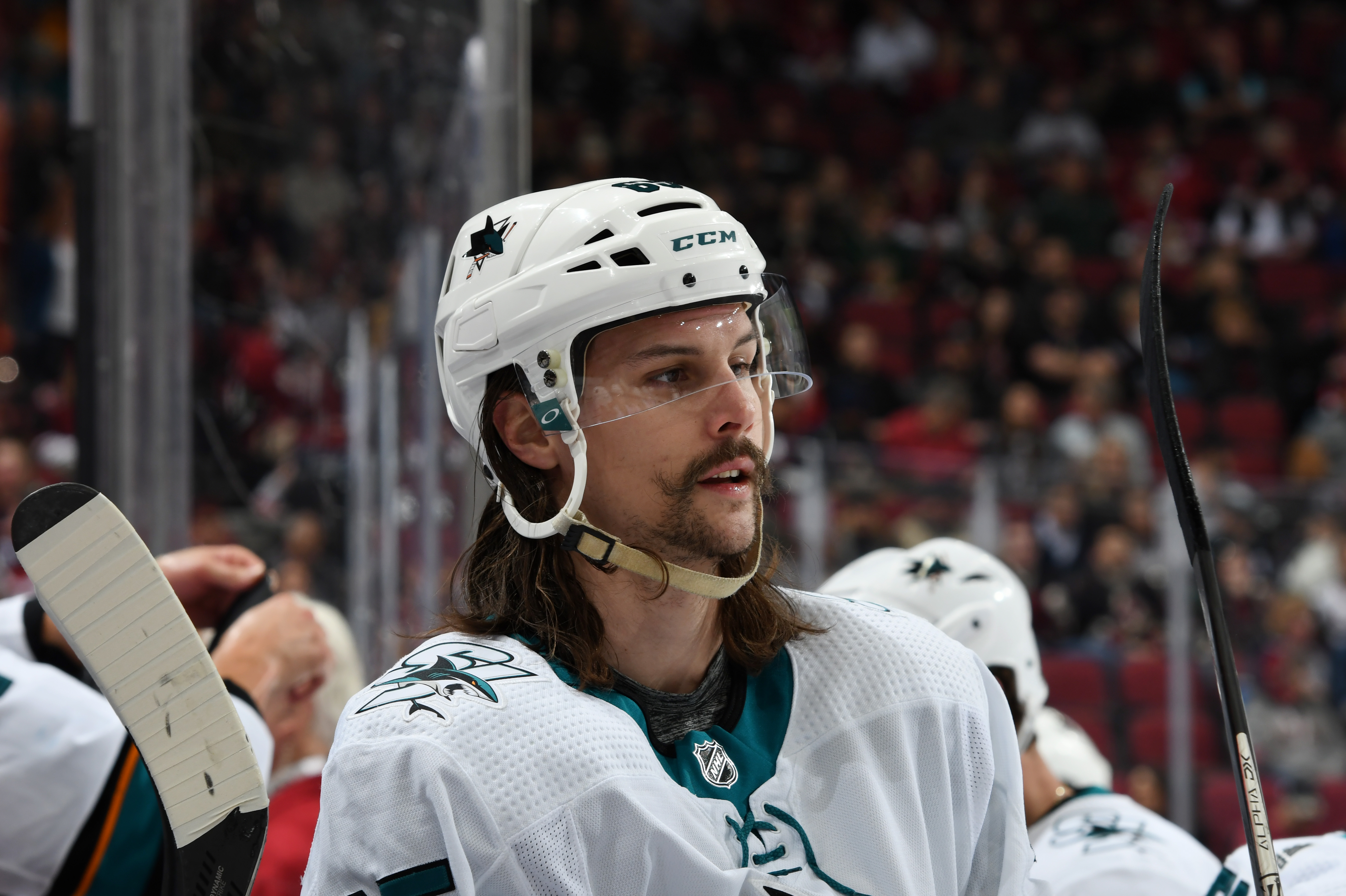 Erik Karlsson #65 of the San Jose Sharks looks up ice during a stop in play against the Arizona Coyotes at Gila River Arena on January 14, 2020 in Glendale, Arizona.
