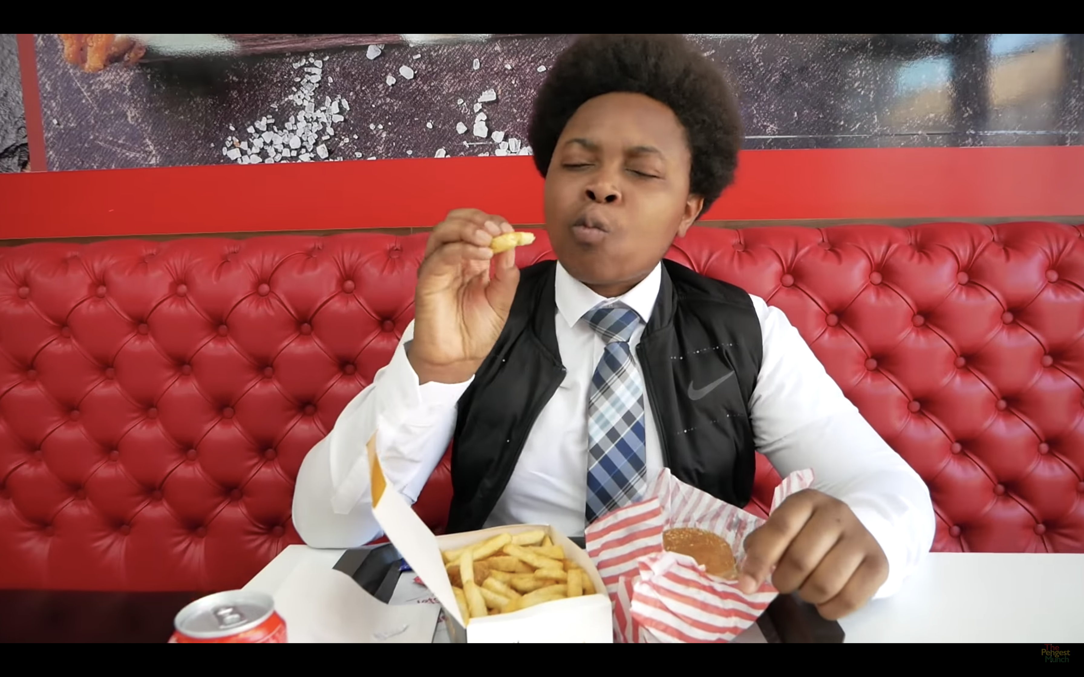 The Chicken Connoisseur, Elijah Quashie, closes his eyes in ecstasy at some outstanding chips on The Pengest Munch