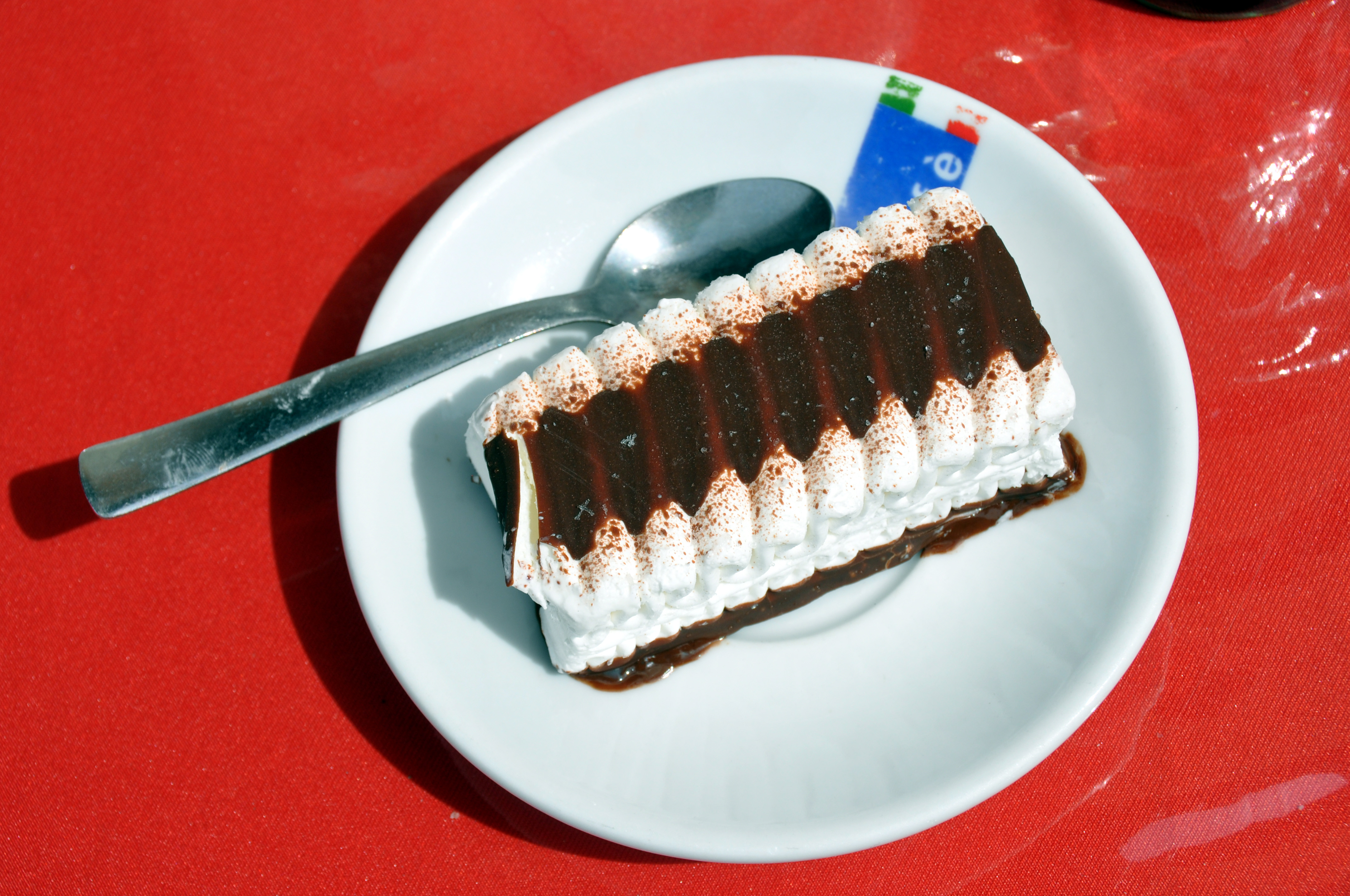 A Viennetta ice cream cake on a white plate