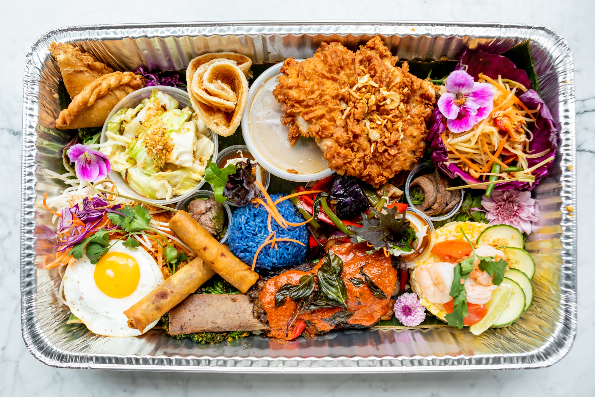 The “Lao Table” takeout tray from Farmhouse Kitchen Thai