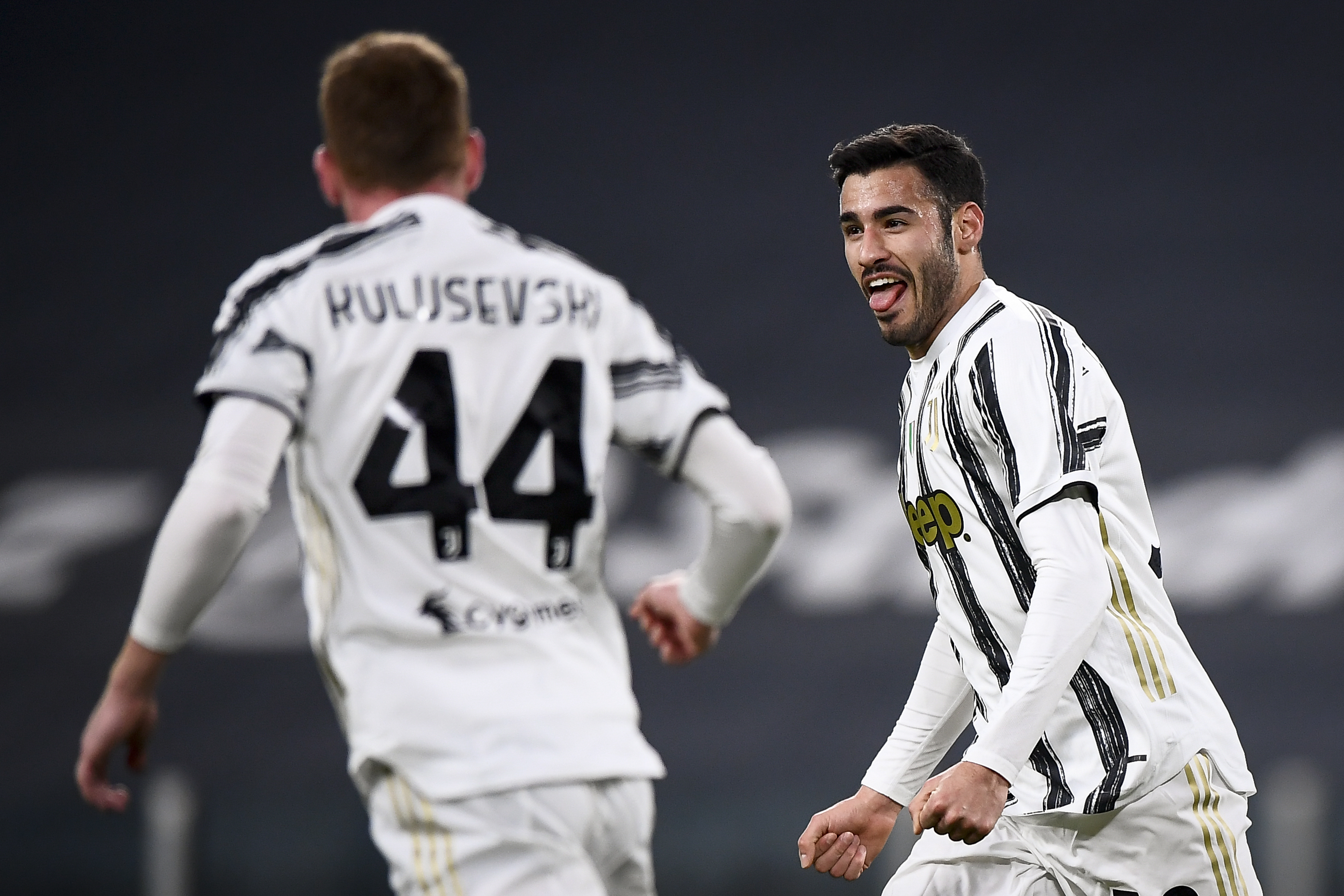Gianluca Frabotta (R) of Juventus FC celebrates with Dejan...
