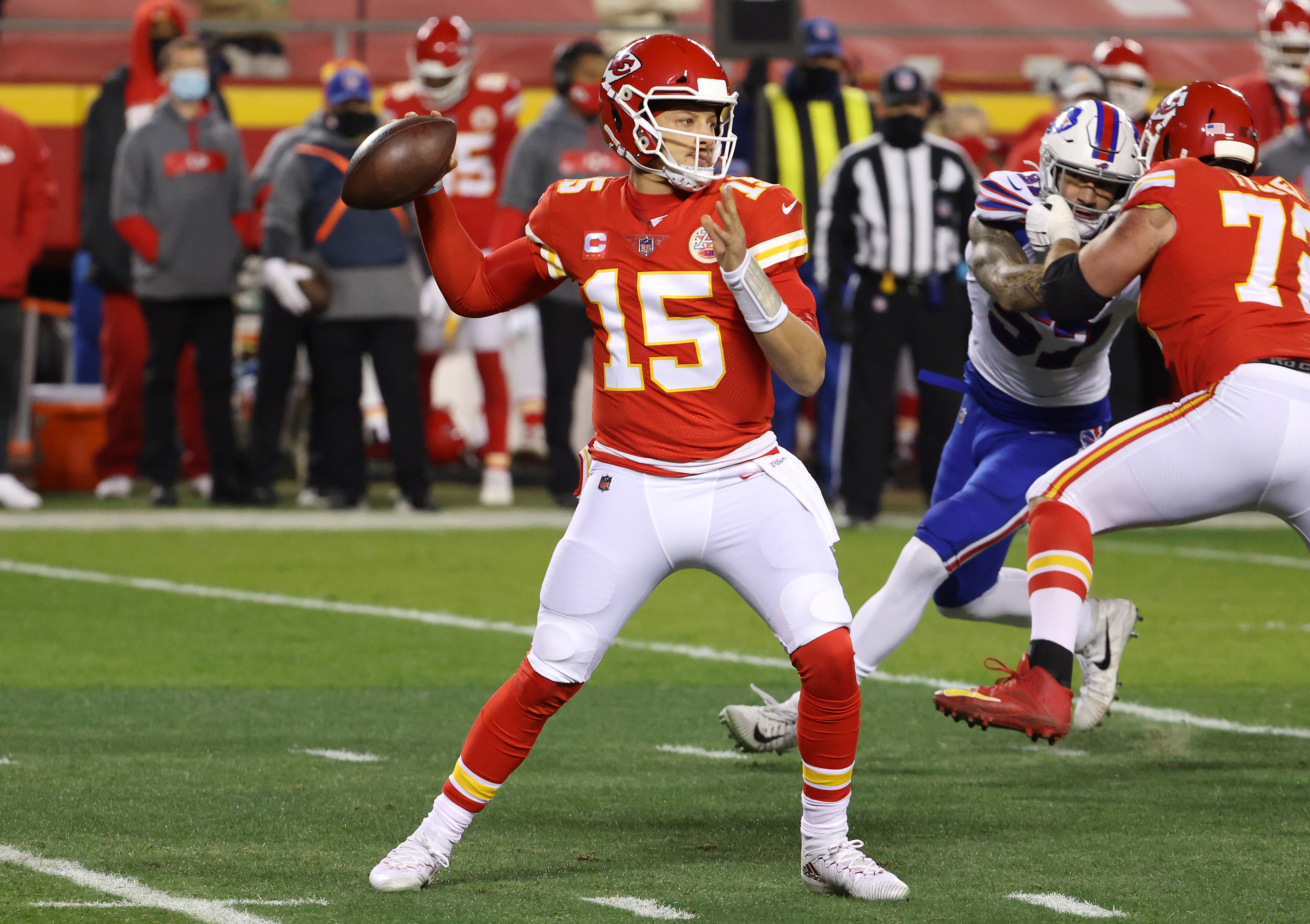 Patrick Mahomes #15 of the Kansas City Chiefs throws a pass in the first half against the Buffalo Bills during the AFC Championship game at Arrowhead Stadium on January 24, 2021 in Kansas City, Missouri.