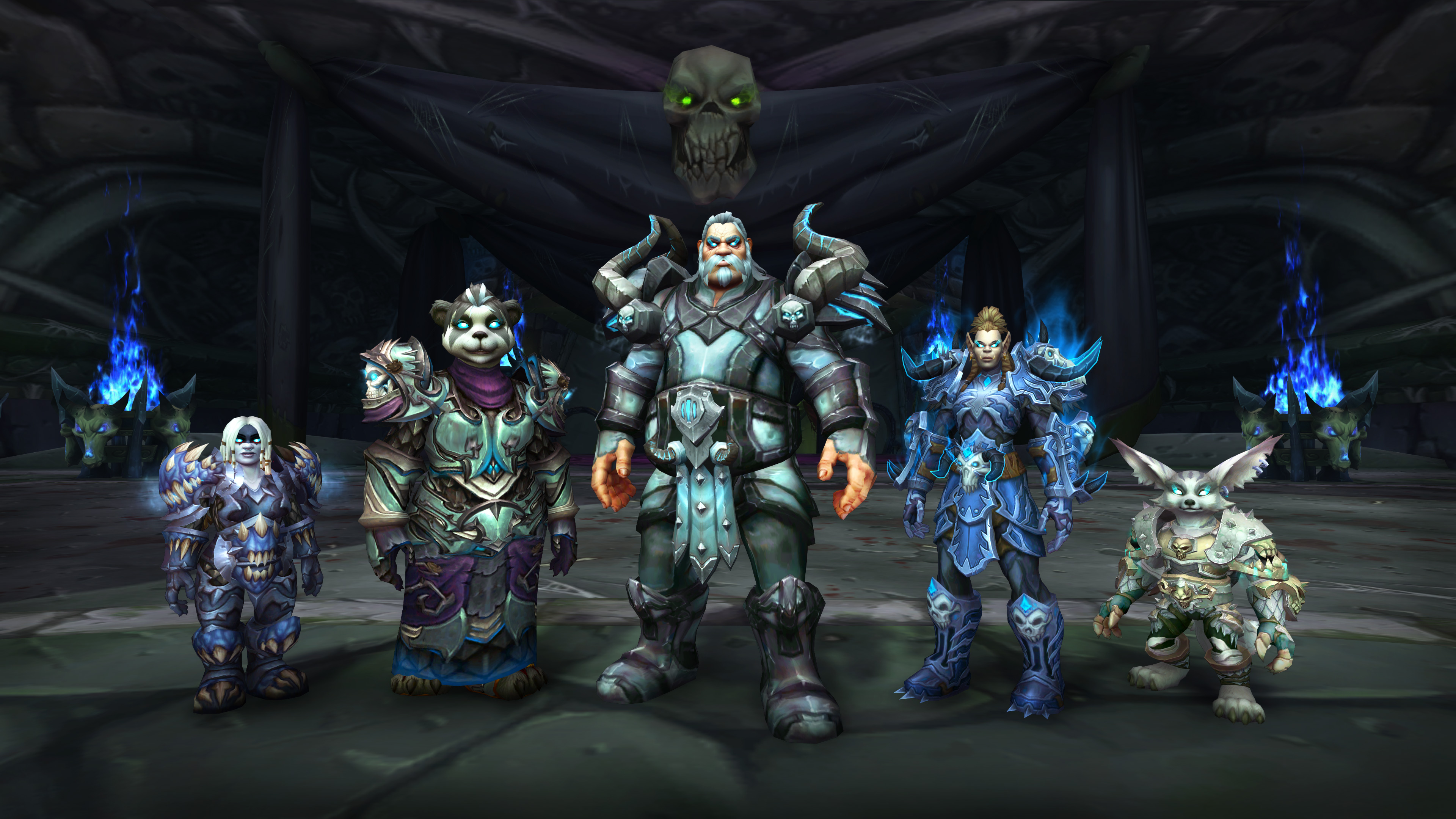 World of Warcraft - A group of players, representing different races from around Azeroth, stand in front of the camera. They are all Death Knights with grim armor and glowing blue eyes.