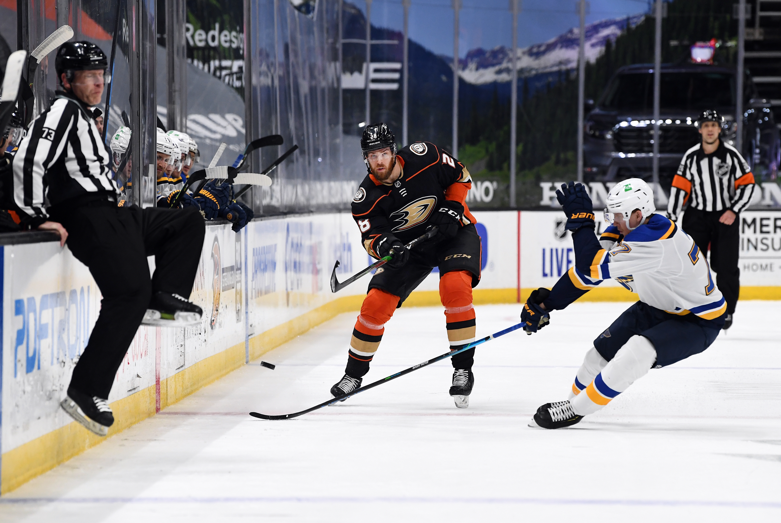 Anaheim Ducks Defenseman Jani Hakanpaa (28) clears the puck during the second period of a game against the St. Louis Blues played on January 31, 2021 at the Honda Center in Anaheim, CA.