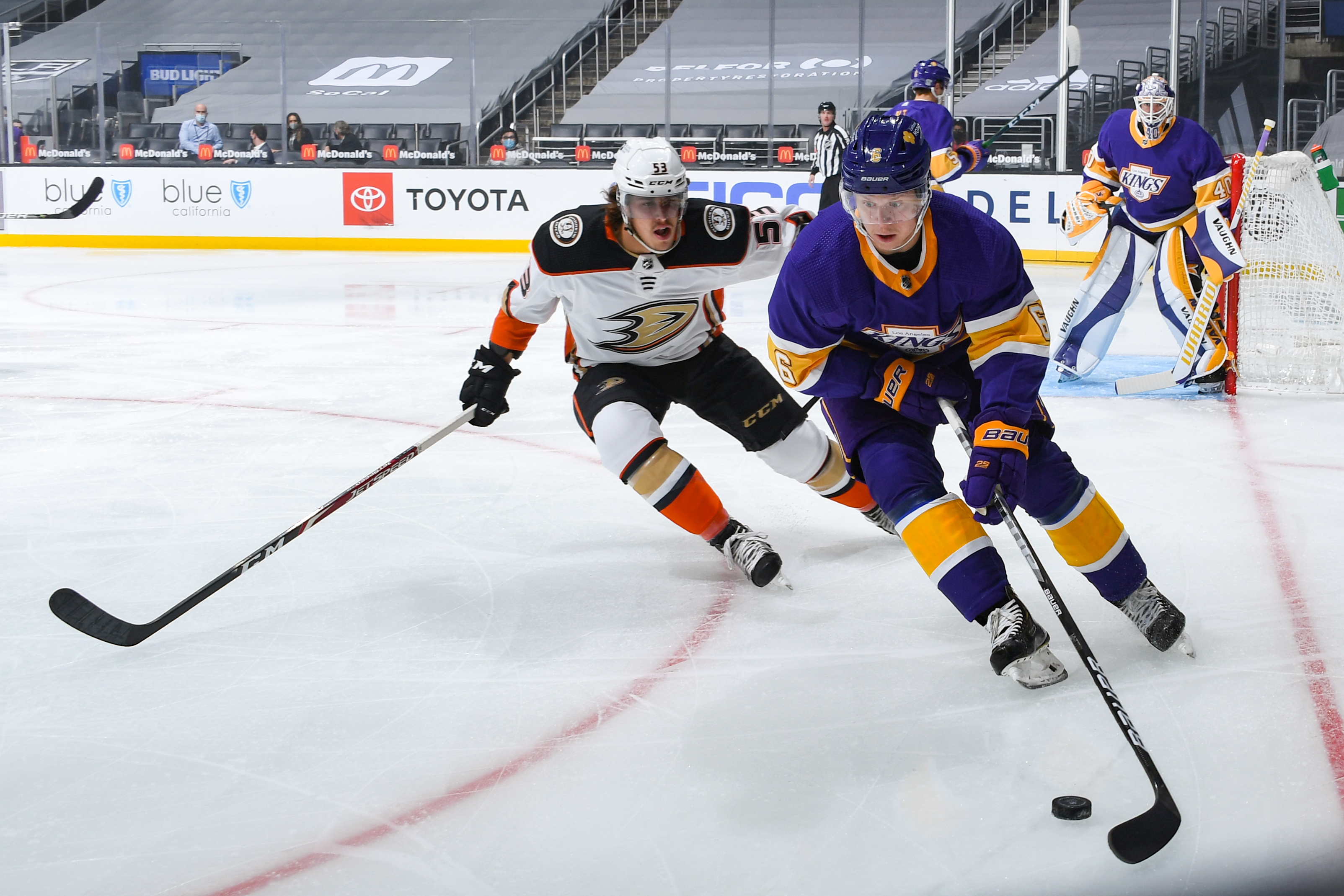Max Comtois #53 of the Anaheim Ducks and and Olli Maatta #6 of the Los Angeles Kings battle for position during the first period at STAPLES Center on February 2, 2021 in Los Angeles, California.